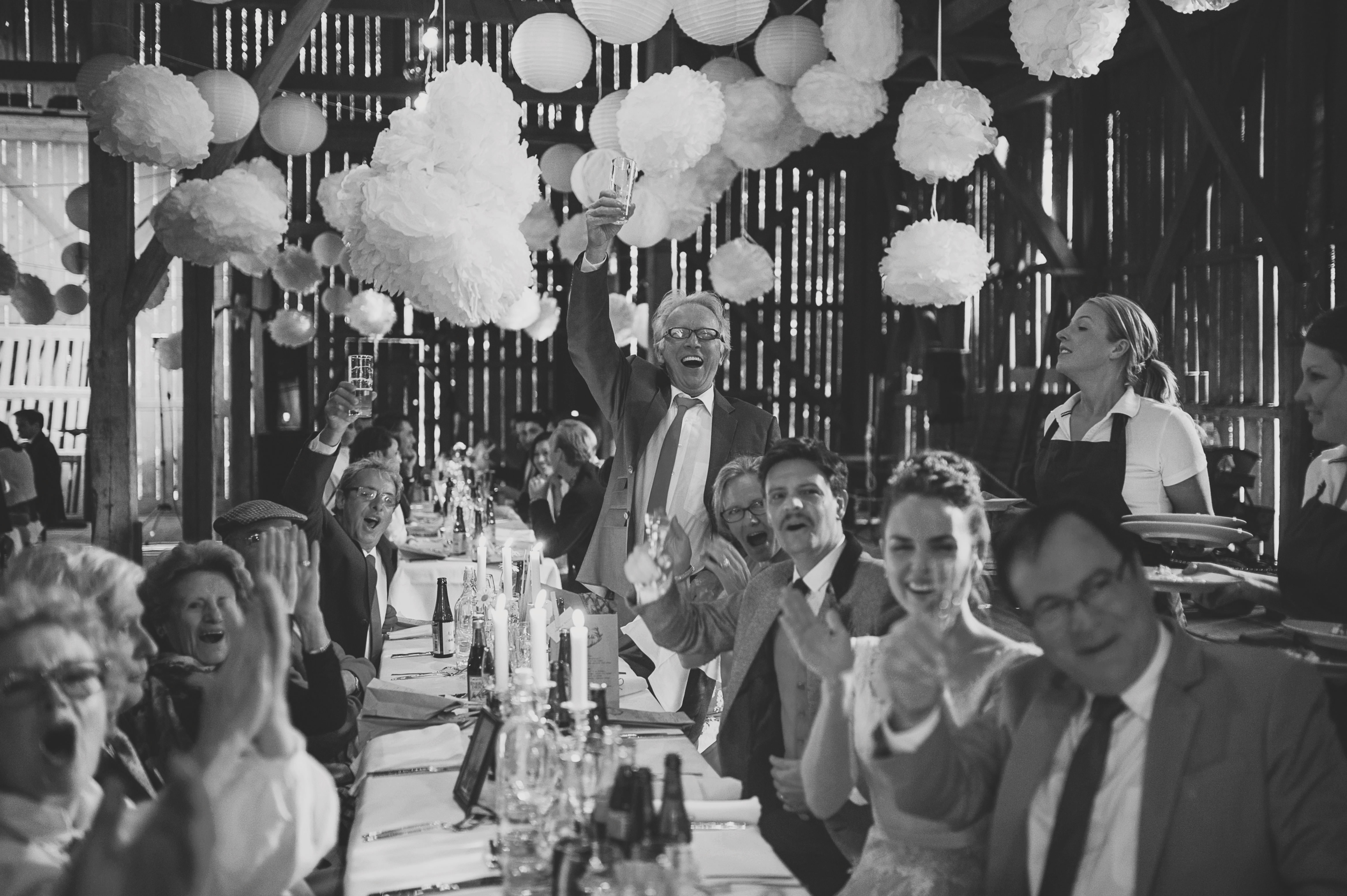 Evening celebrations inside the old barn at Beckershof