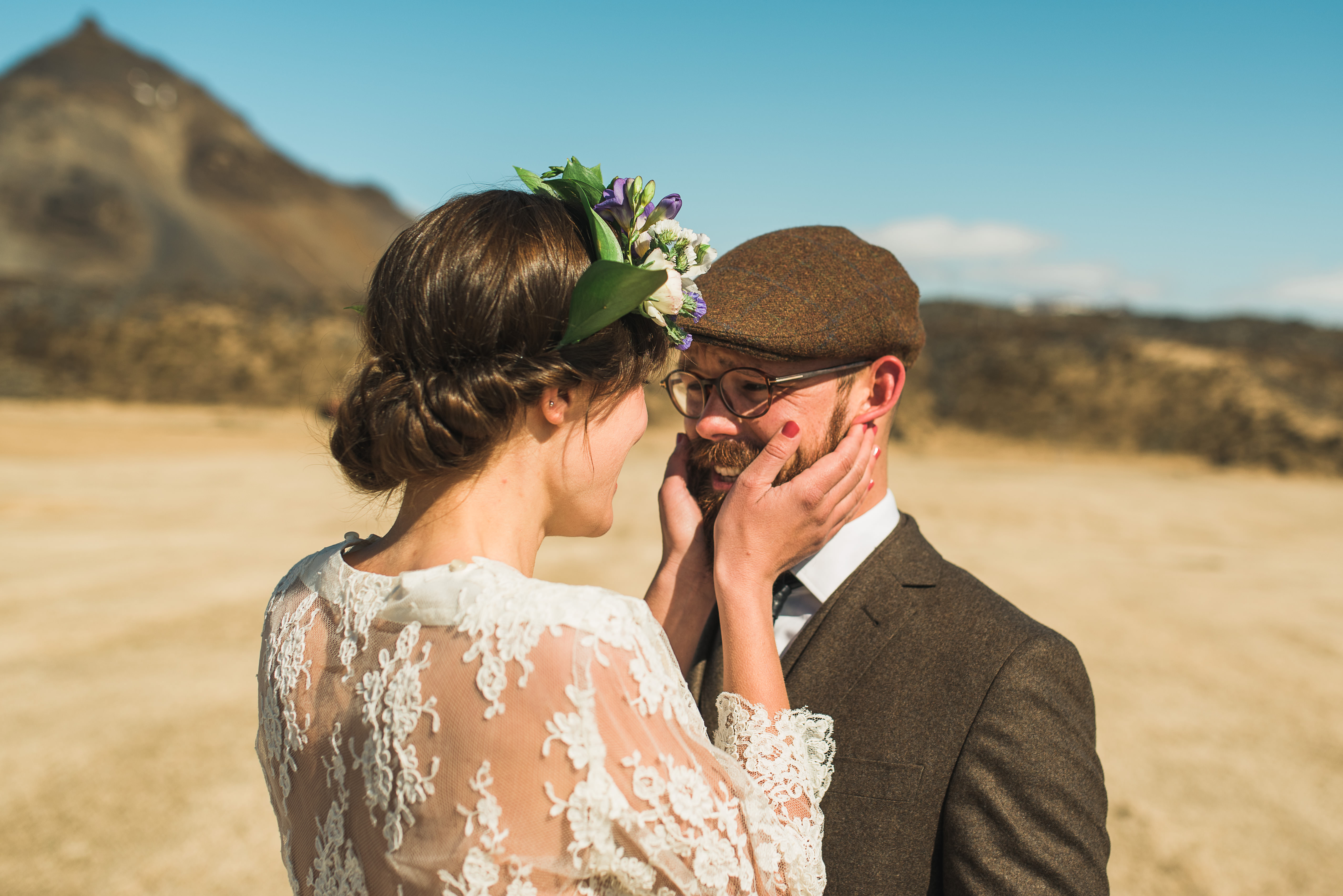 Couple portraits on the rugged Snæfellsnes coastline in Iceland by the North Atlantic coastline