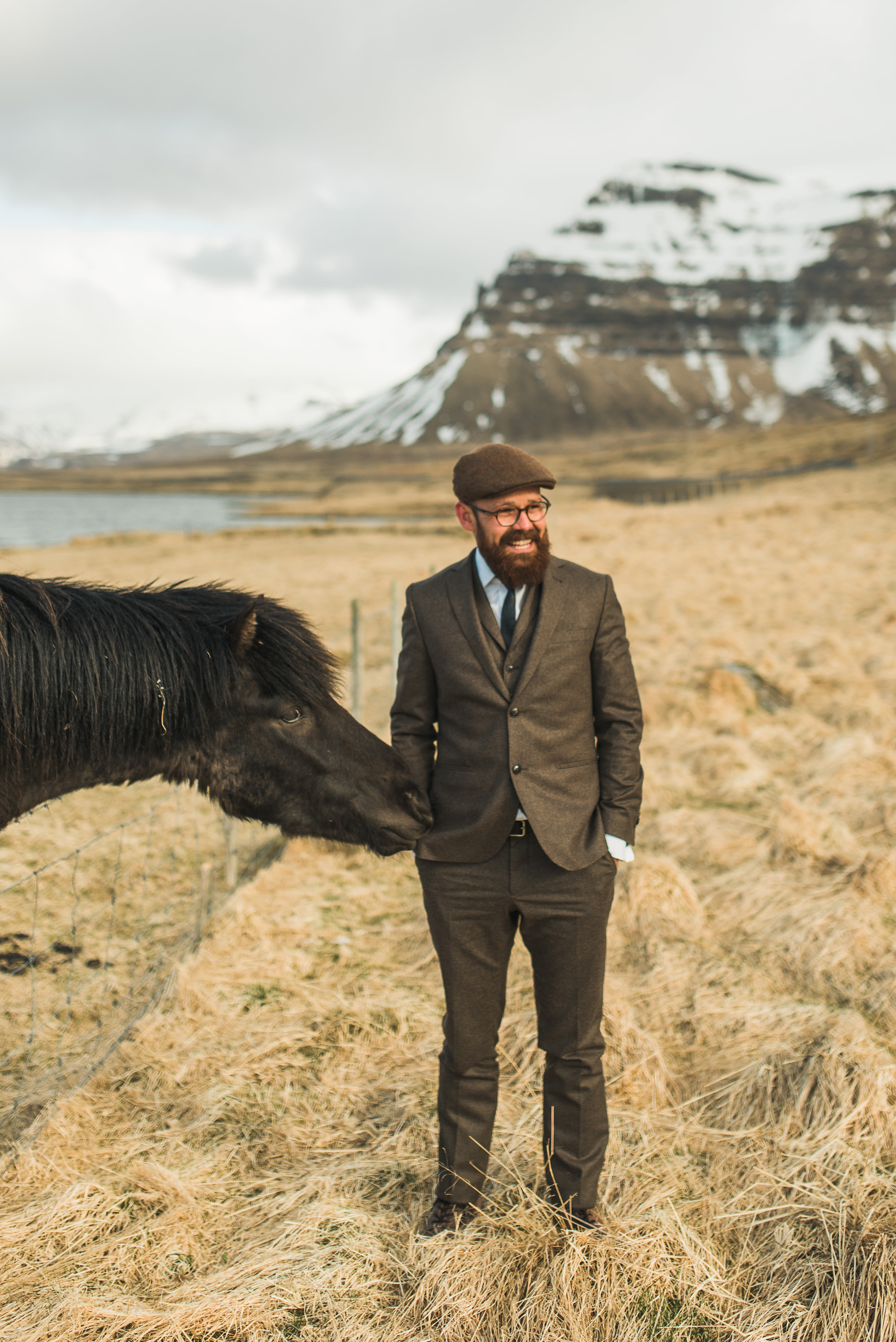 Coastal cliff portraits during Céline and Ben elopement in Iceland by the North Atlantic coastline