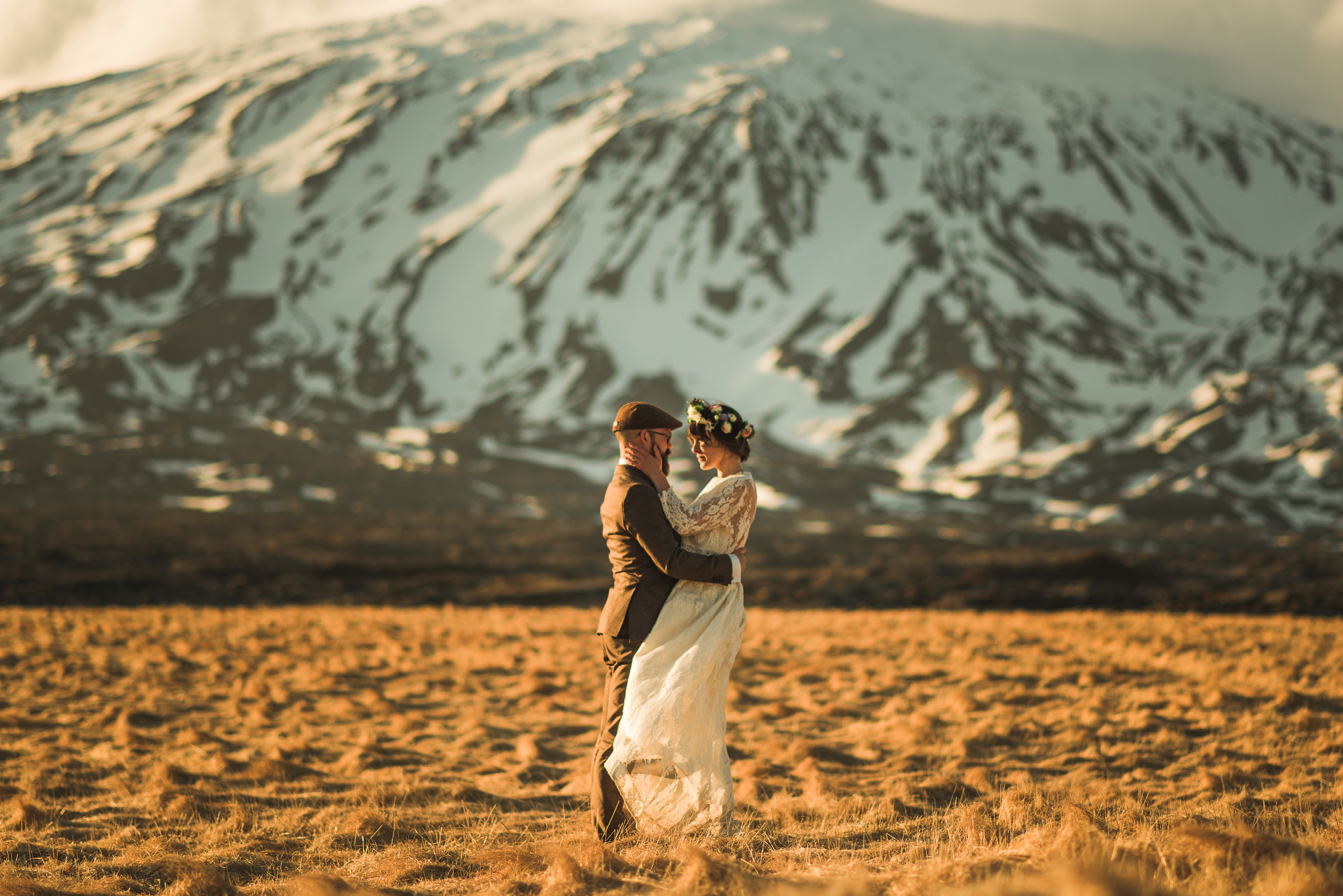 Golden hour elopement portraits on the Snæfellsnes Peninsula Iceland with dramatic Icelandic sky