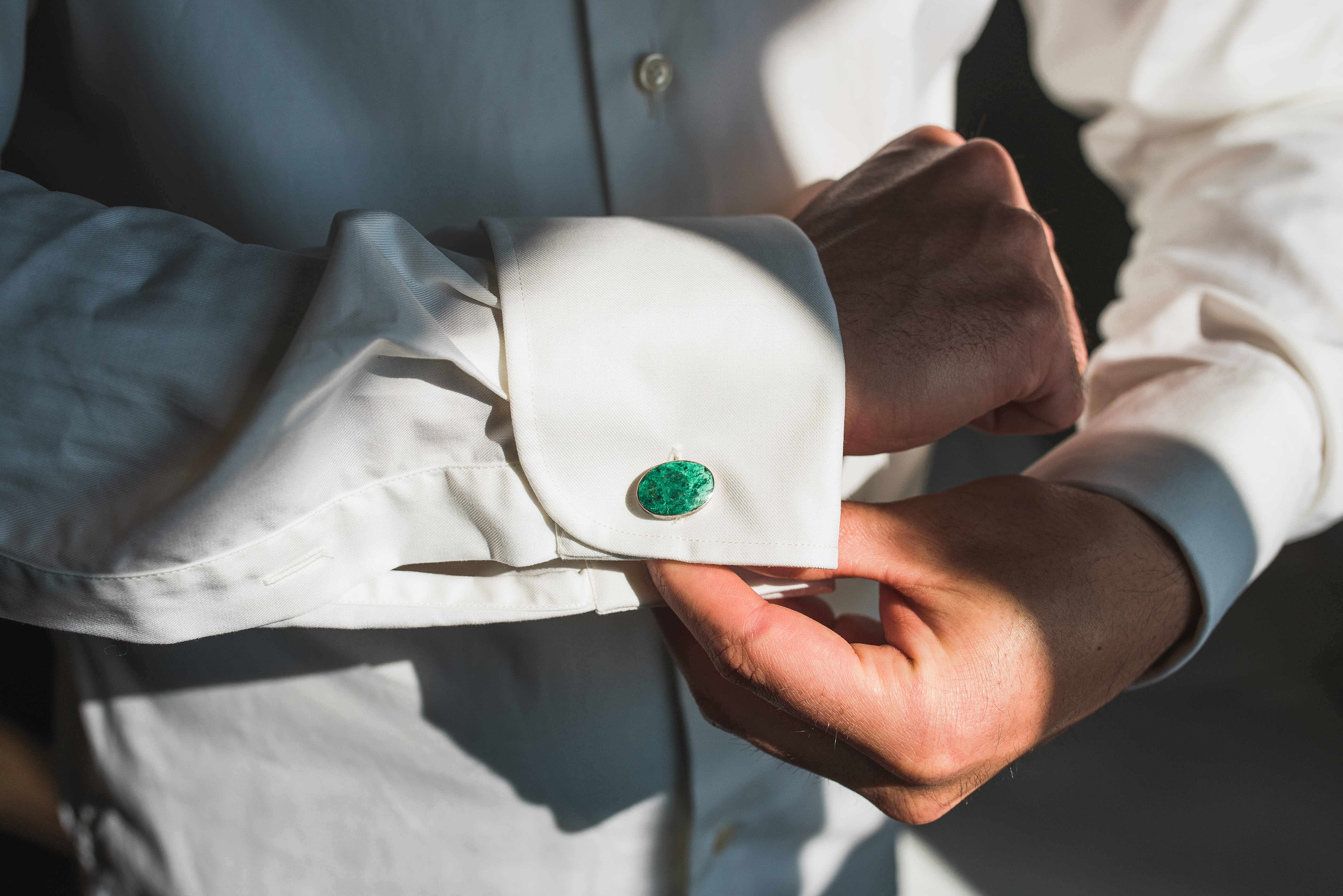 Céline and Ben preparing for their Iceland elopement at Hellnar on the coastal path near Hellnar