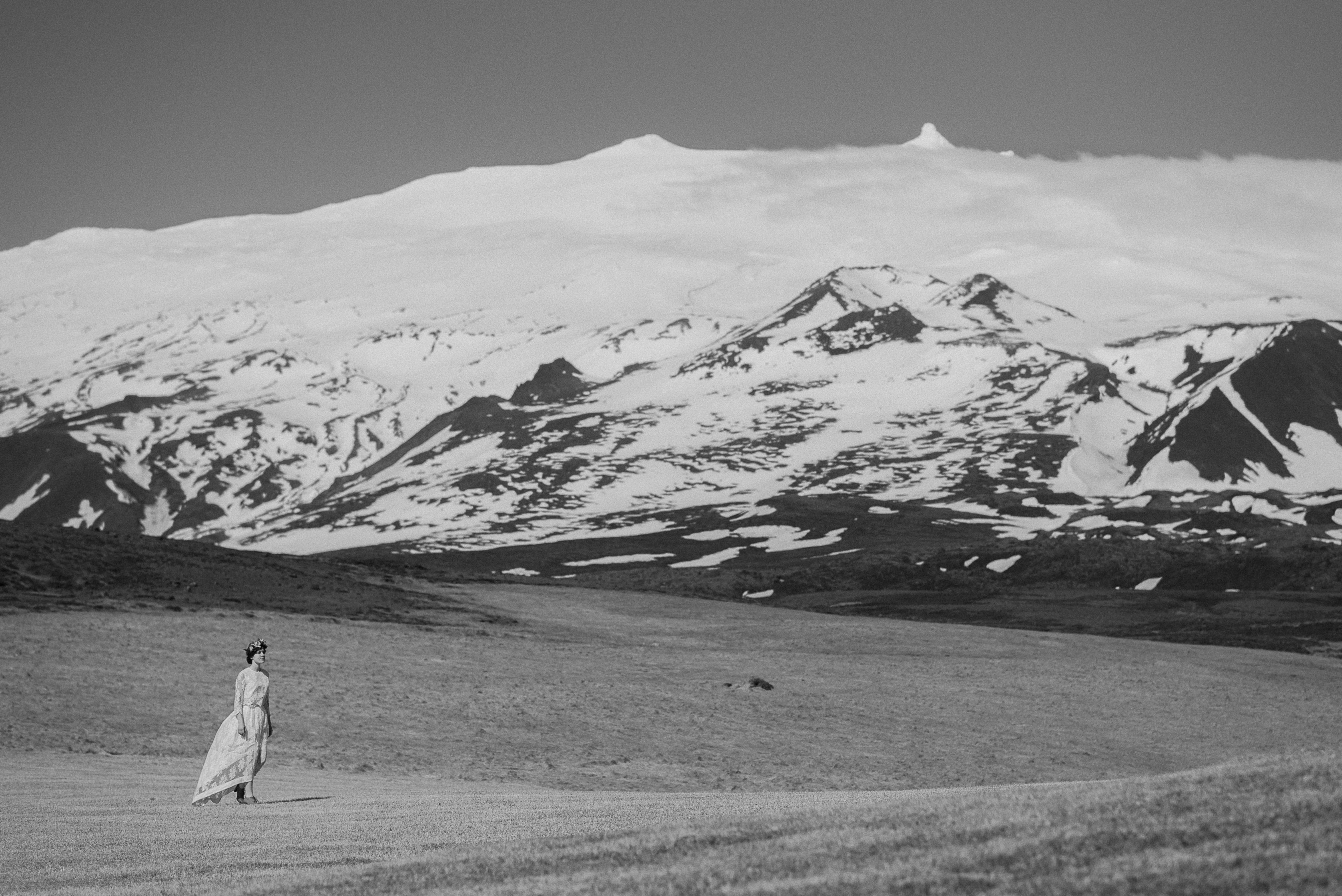 Céline and Ben preparing for their Iceland elopement at Hellnar with Snæfellsjökull glacier backdrop