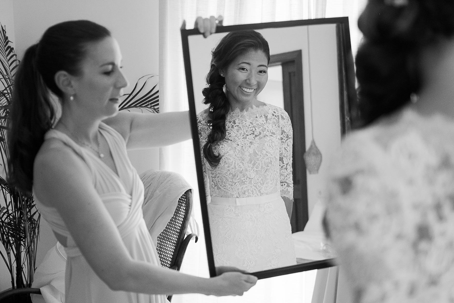 Bride getting ready at the mirror, Mallorca wedding