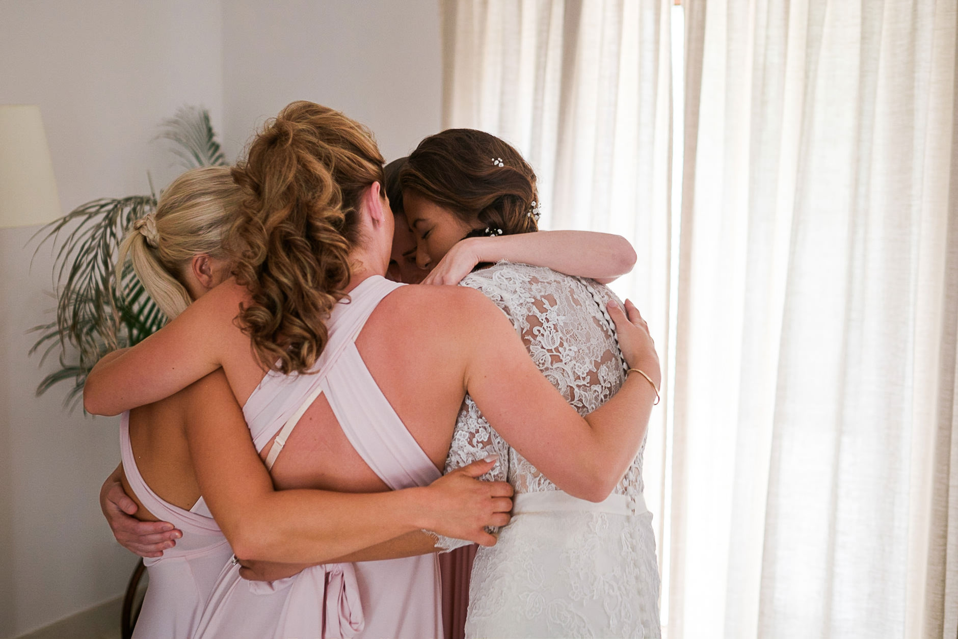 An emotional embrace as the bride gets ready, Mallorca wedding