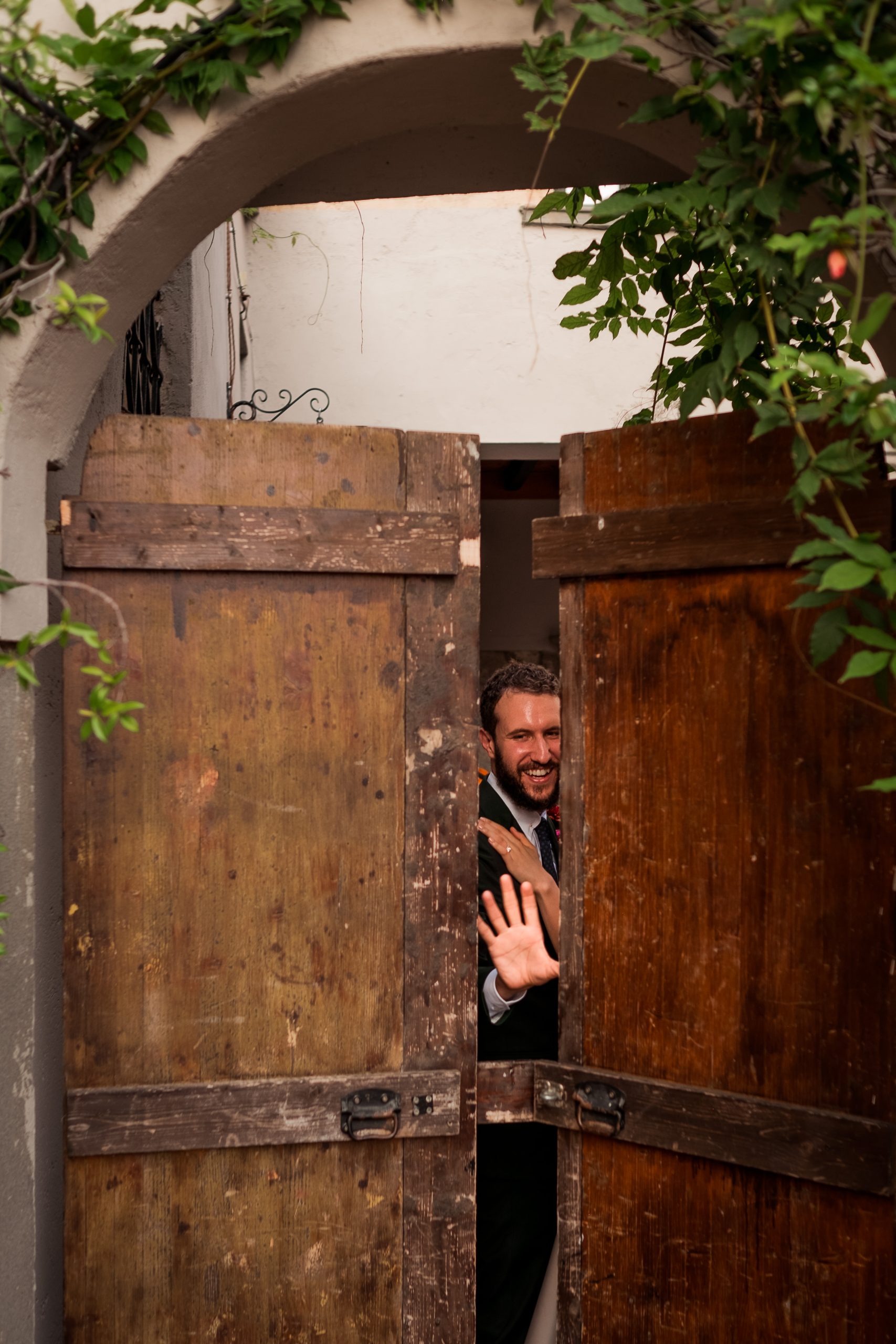 Couple walking through Castello Oldofredi grounds, Monte Isola