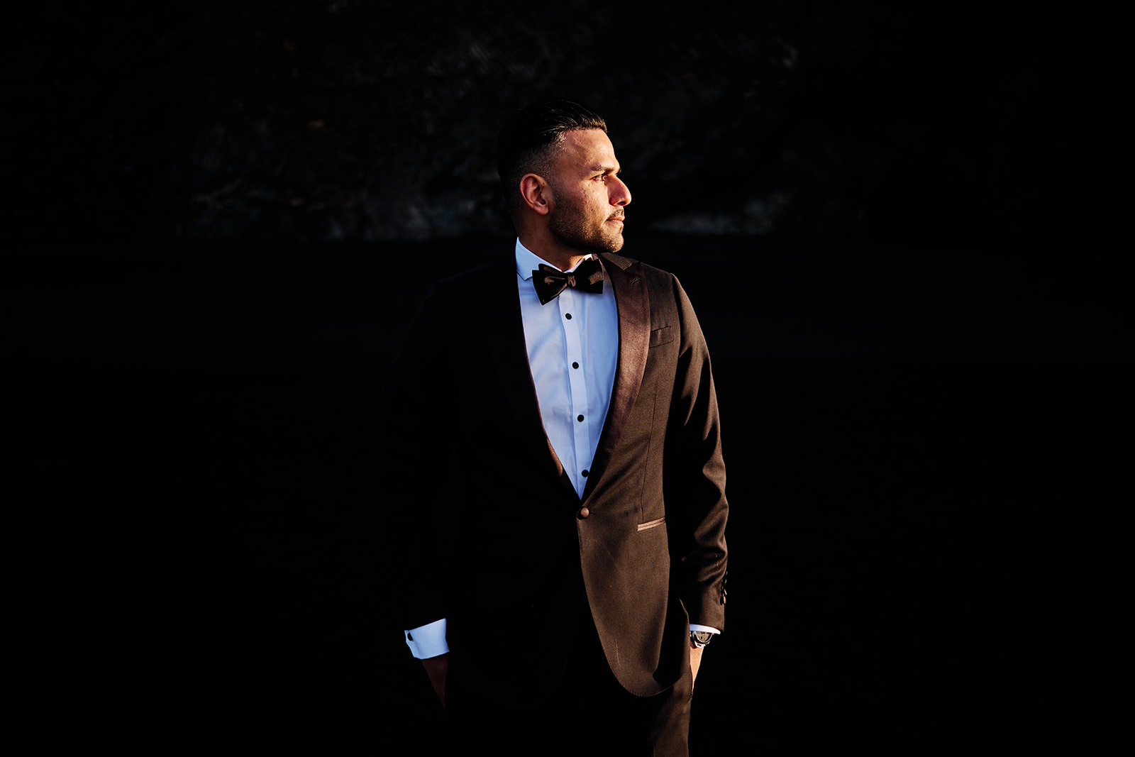 Walking away from Skogafoss during south Iceland elopement session