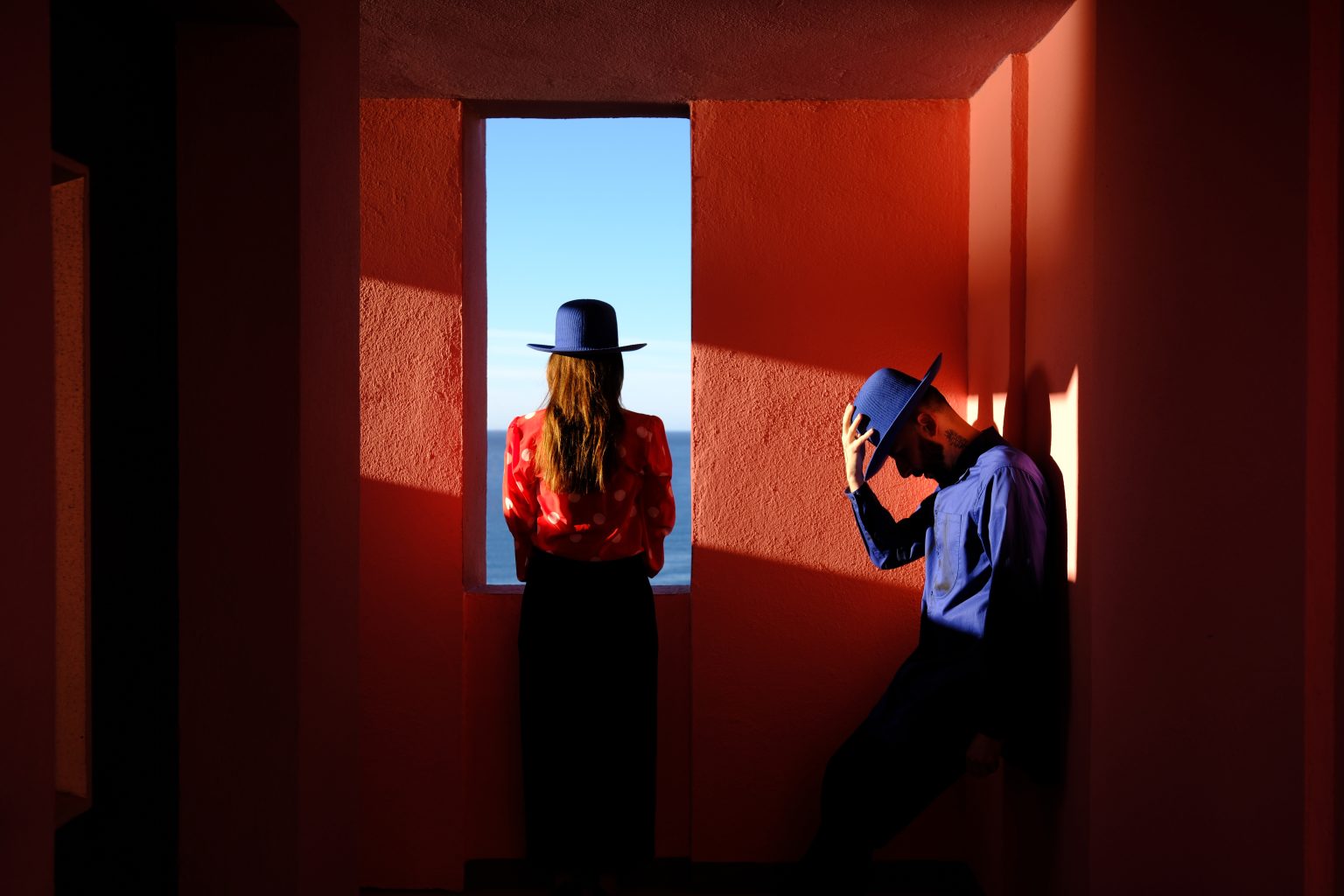 Adriana and Ondrej in a doorway of warm evening light at Muralla Roja