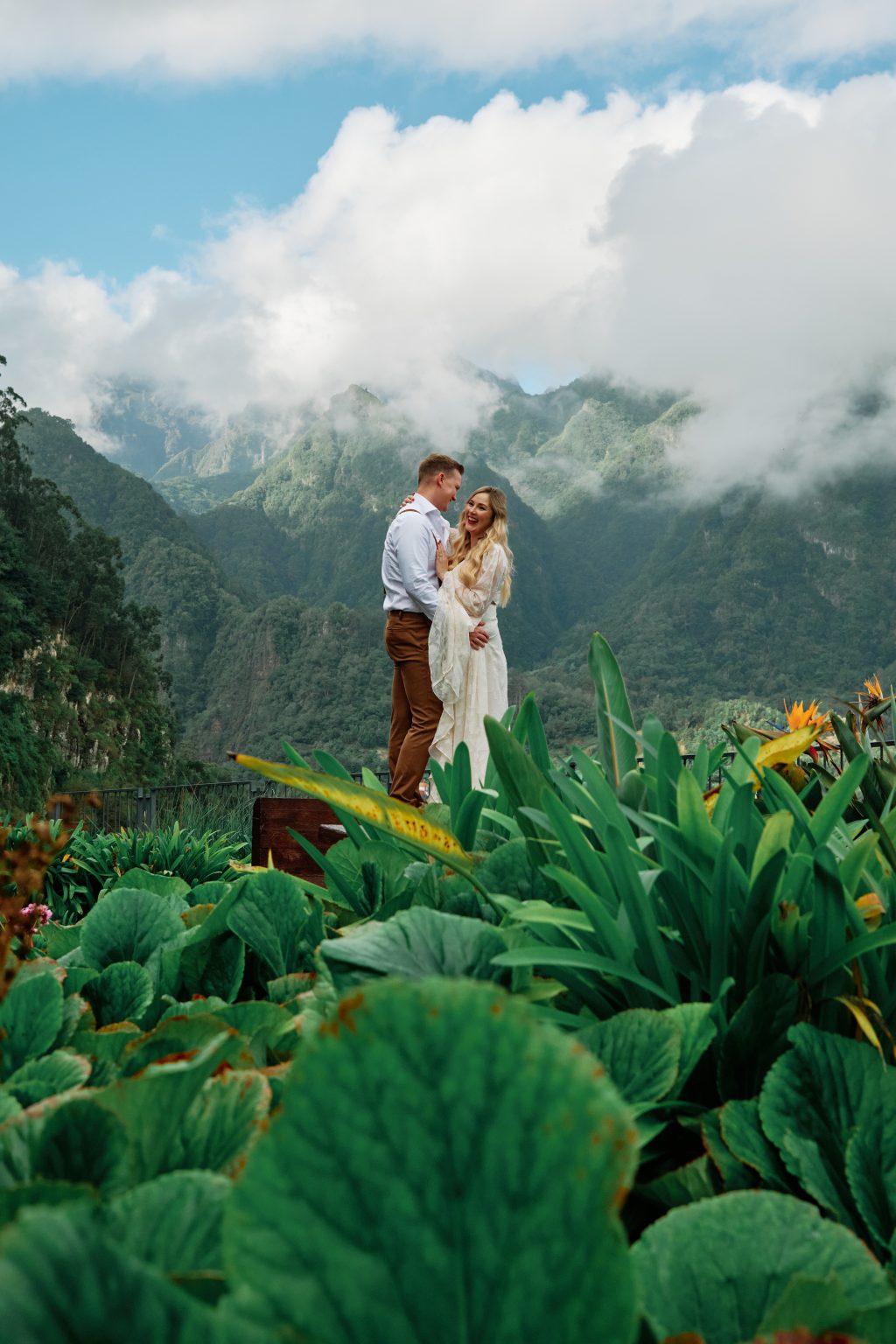 Couple embracing in the green laurel forest at Queimadas, Madeira