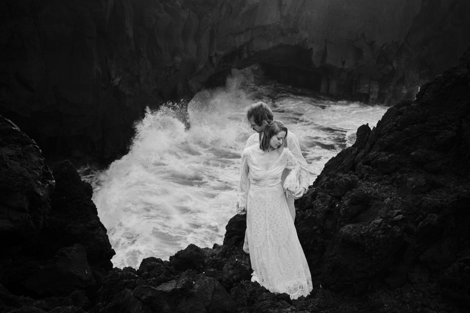 The couple inside a churning lava cove on São Miguel’s coast