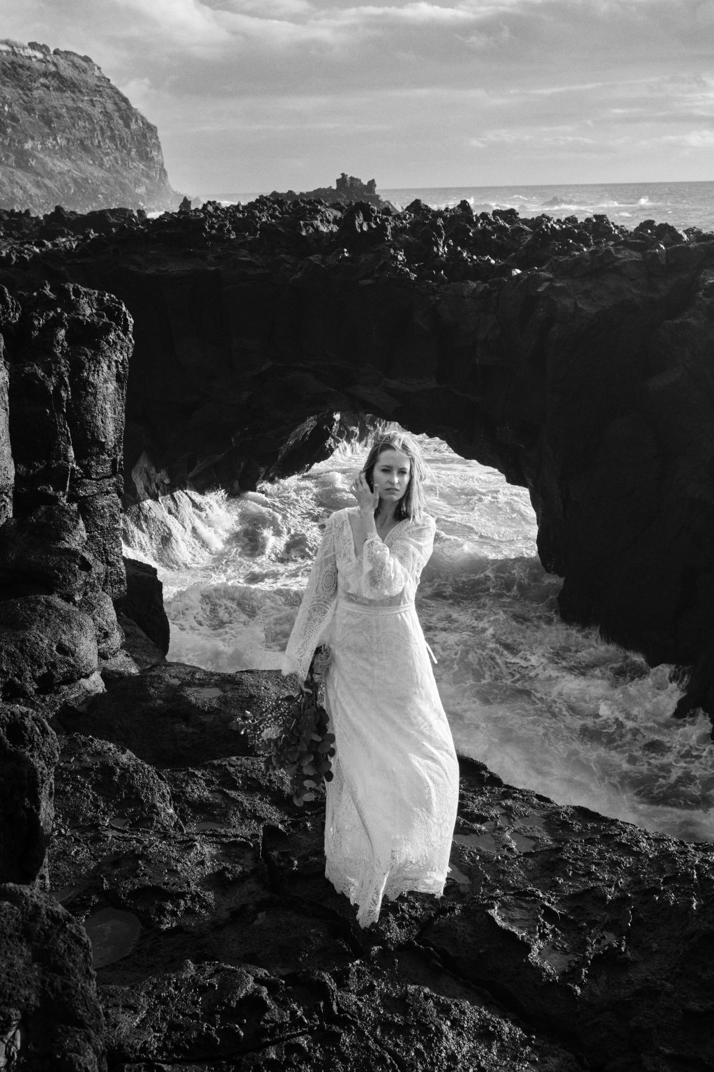 Kasia in the mouth of a sea cave on São Miguel, Azores