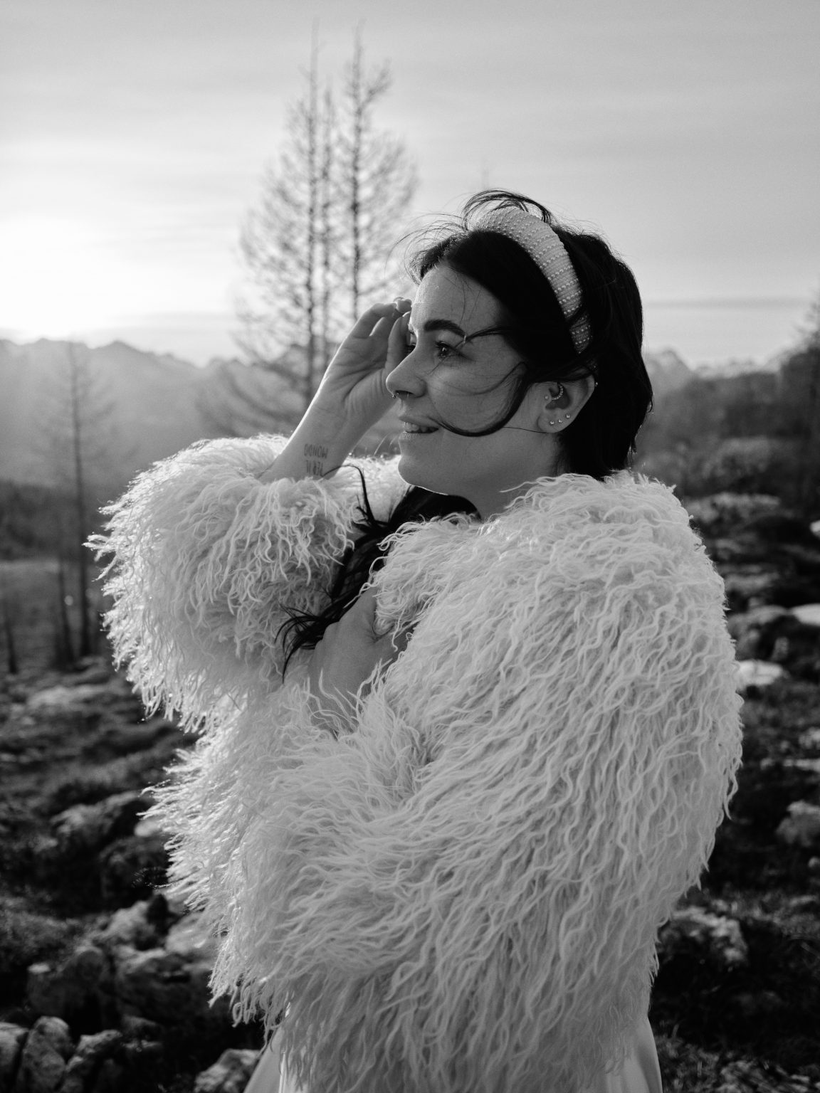 Elisa in soft morning light at Cinque Torri, Dolomites engagement photographer