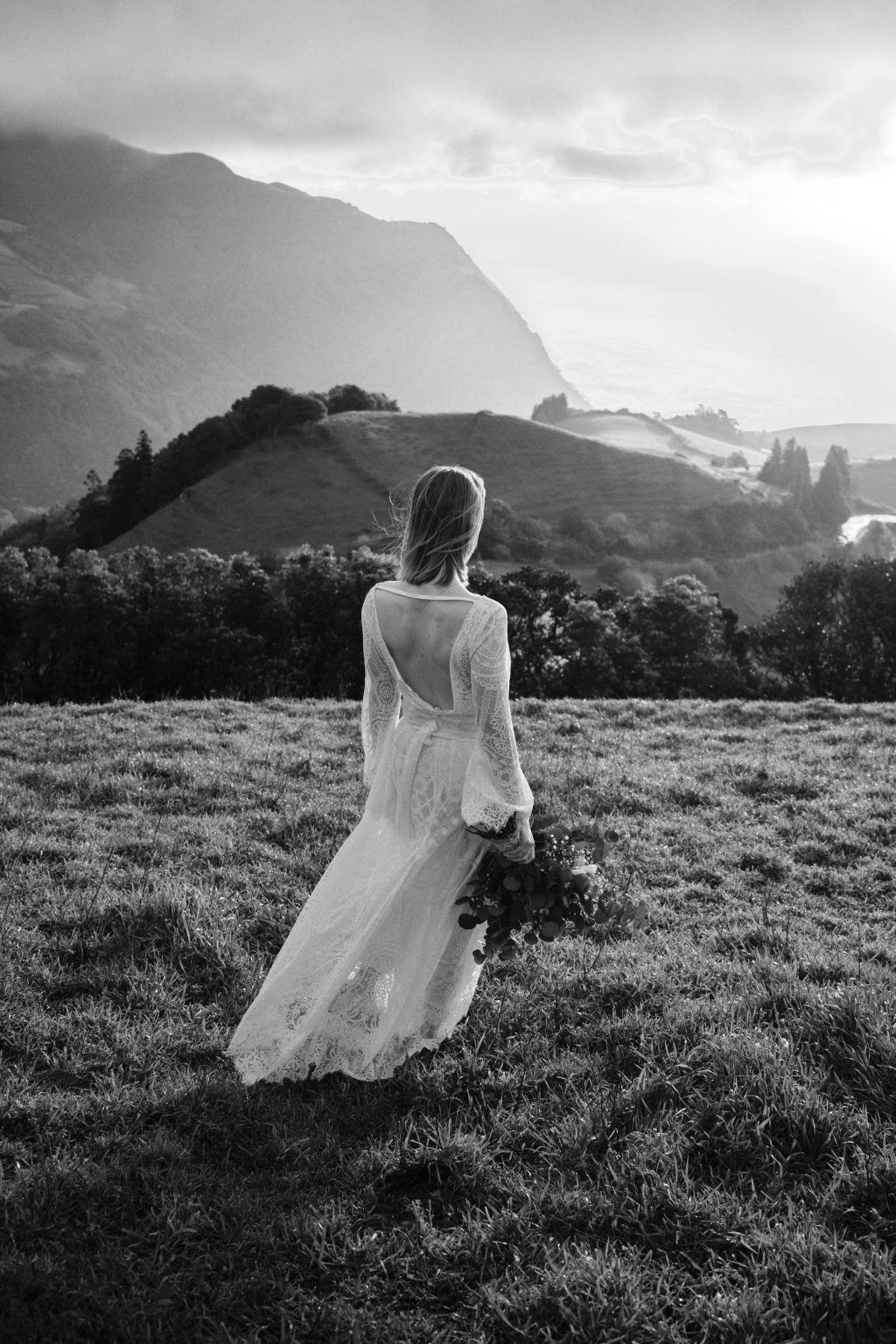 Kasia walking through the tall grass on São Miguel, Azores