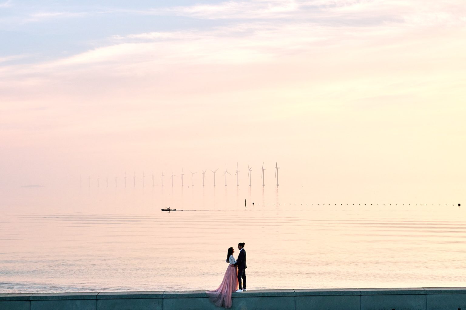 A jetty running into the sea before sunrise outside Copenhagen