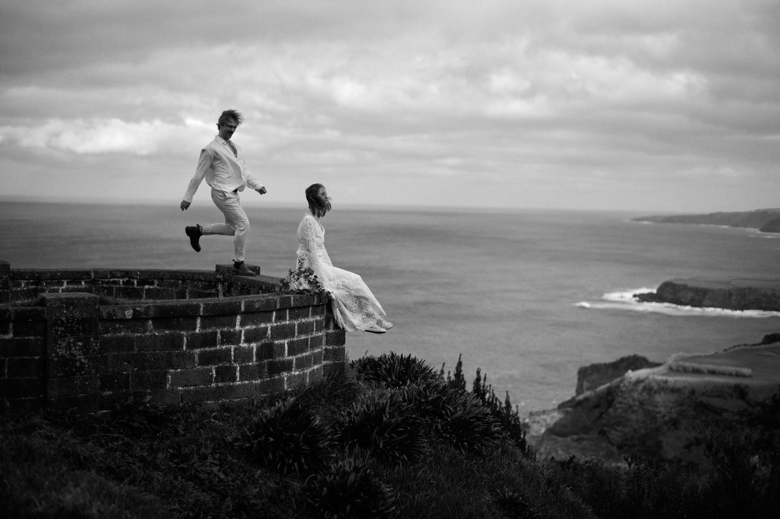 Leaping along old ruins above the coast of São Miguel
