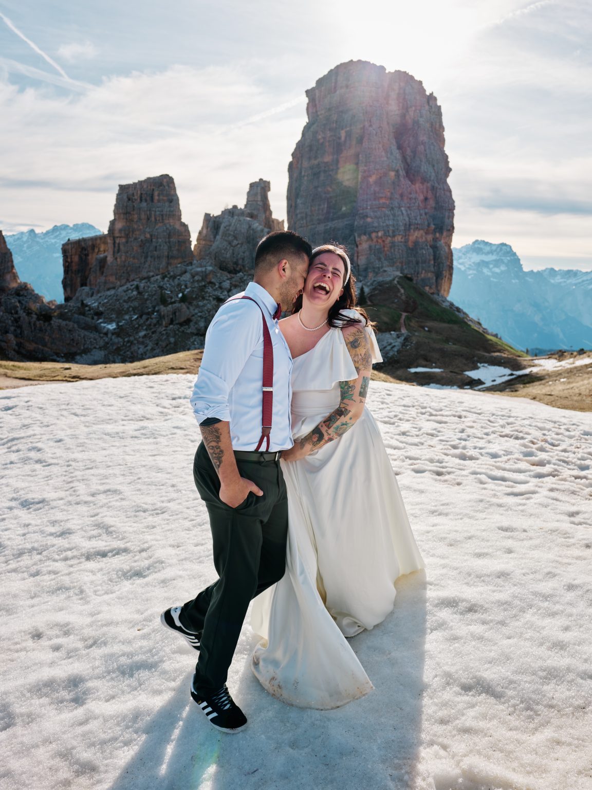 Elisa and Hector laughing at Cinque Torri, Dolomites engagement session