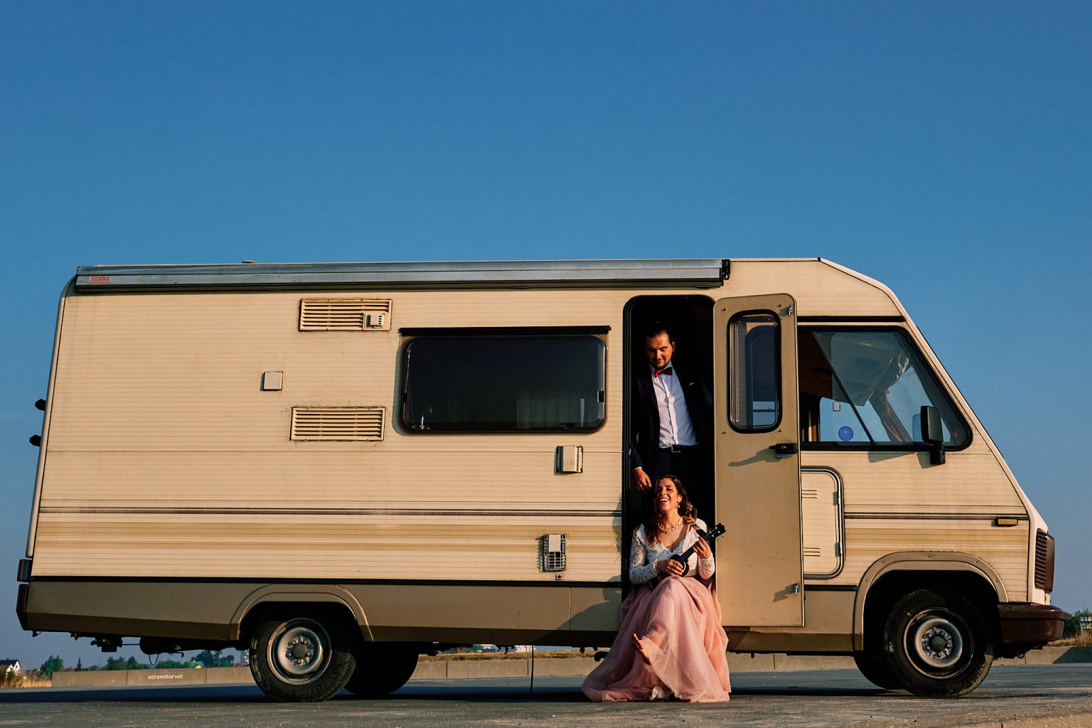 The caravan door open in the early light outside Copenhagen