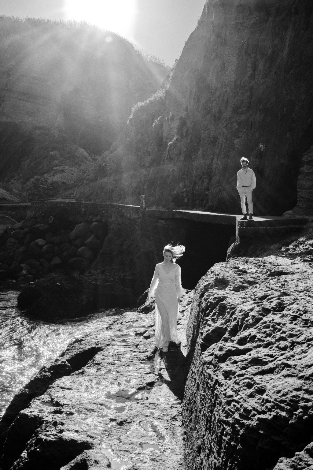 Standing on the old weir between the cliffs on São Miguel