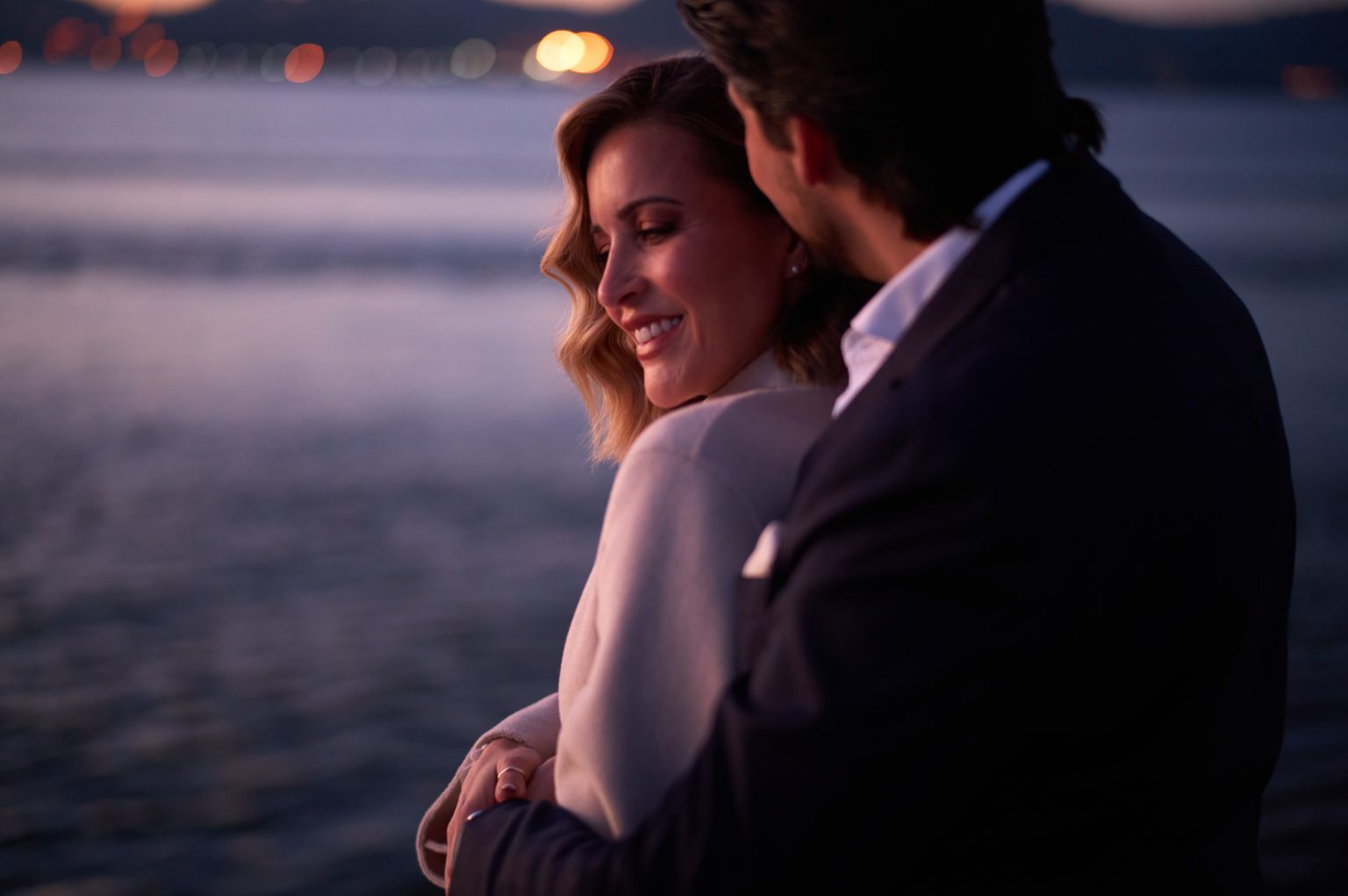 Ana and David on the Tejo waterfront before sunrise in Lisbon