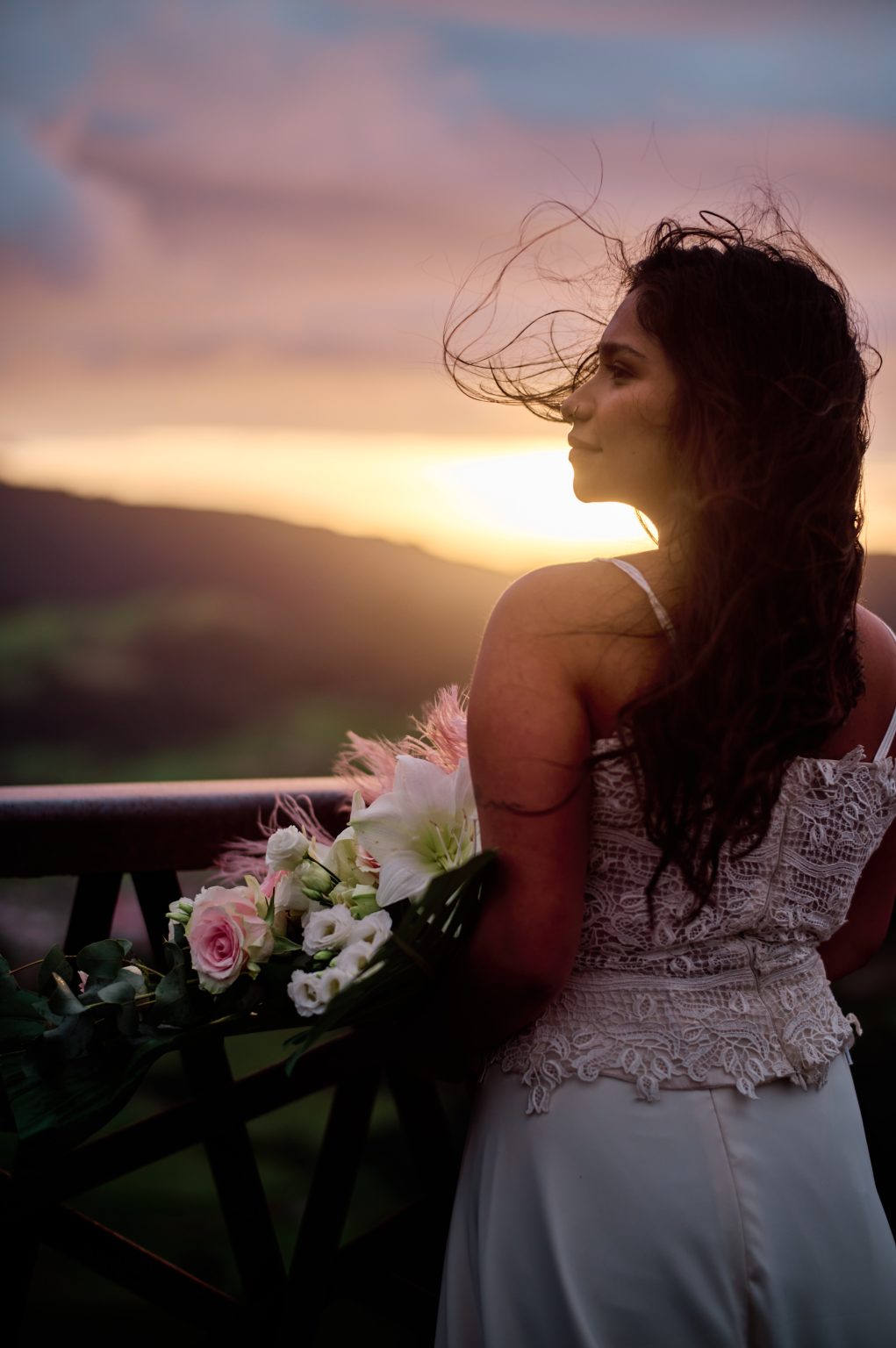 Bride with a lily bouquet in the sunrise light, São Miguel, Azores