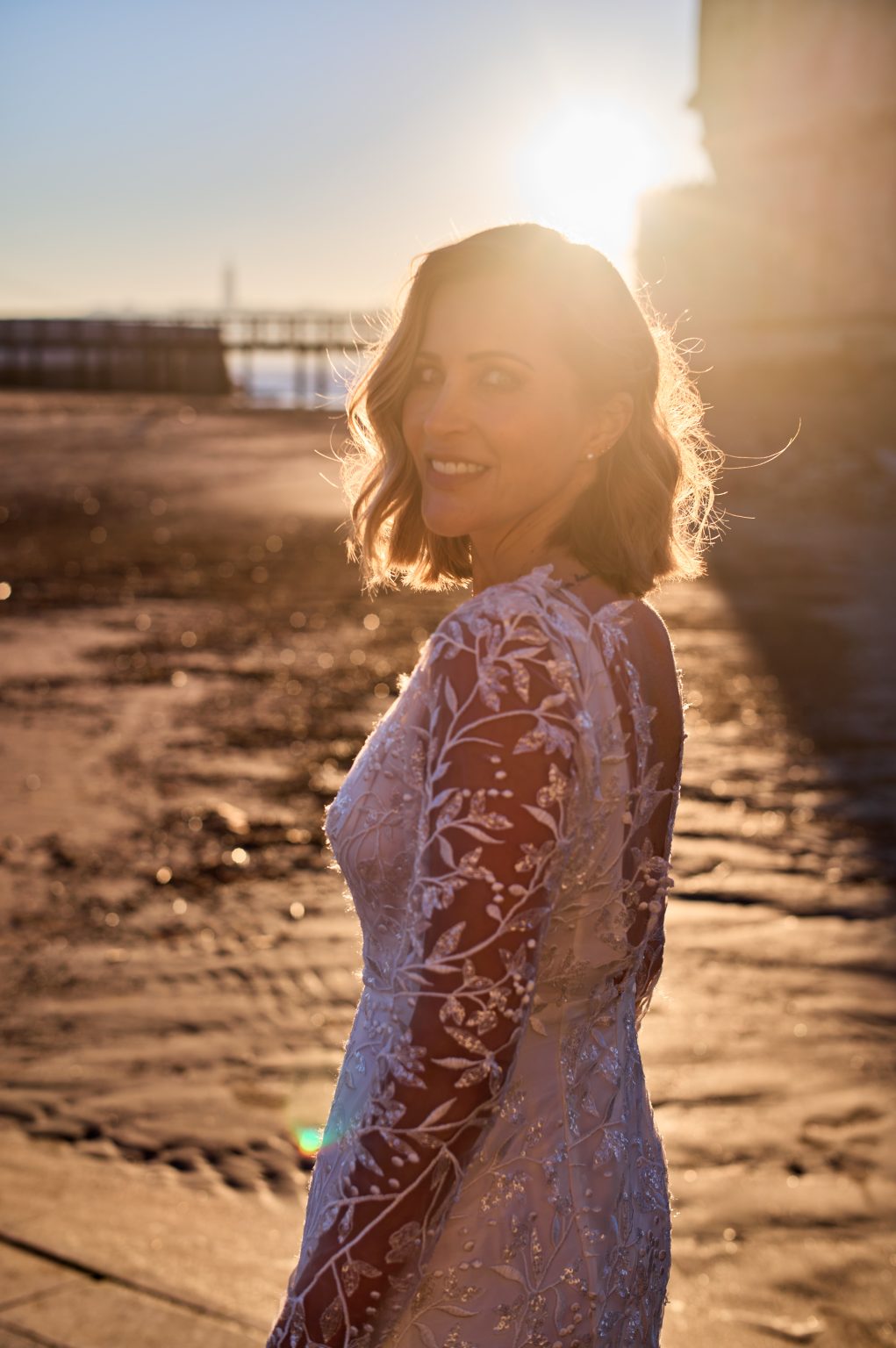 Morning sun through Ana’s hair beside the Tejo in Lisbon