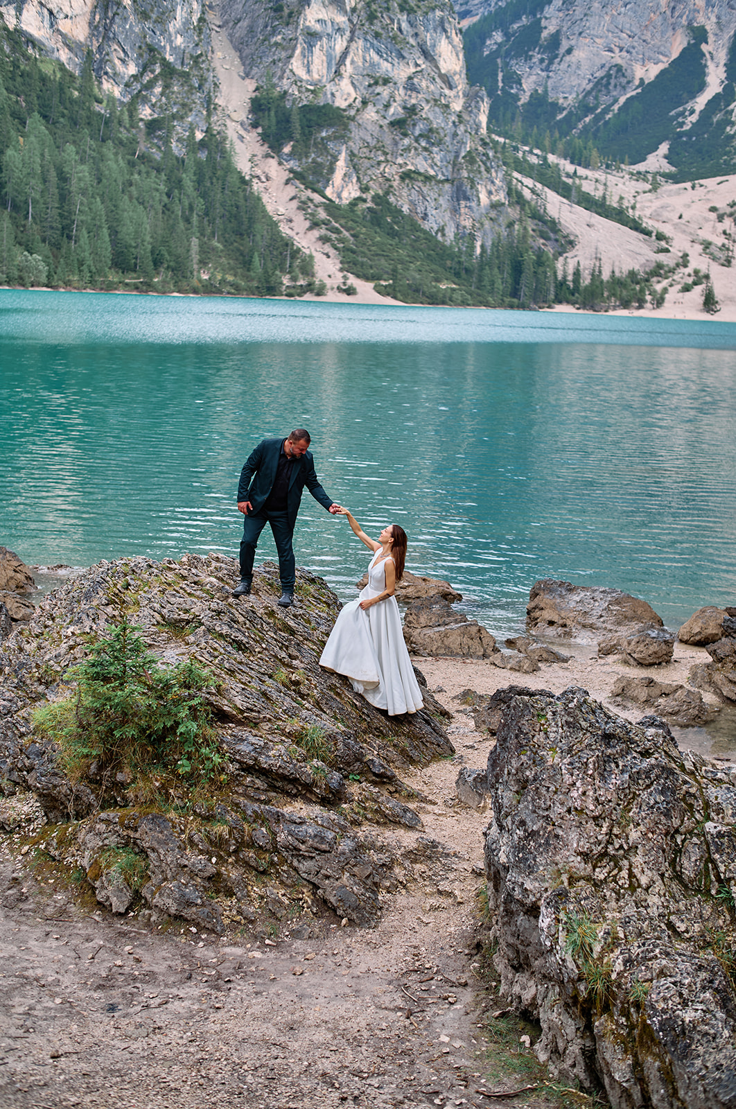 Couple at the Lago di Braies boathouse, Dolomites