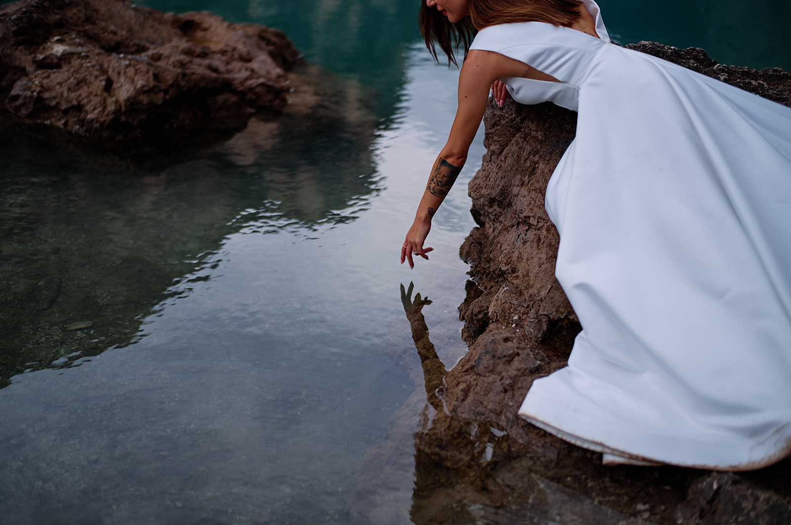 Black and white bridal portrait at Lago di Braies, Dolomites