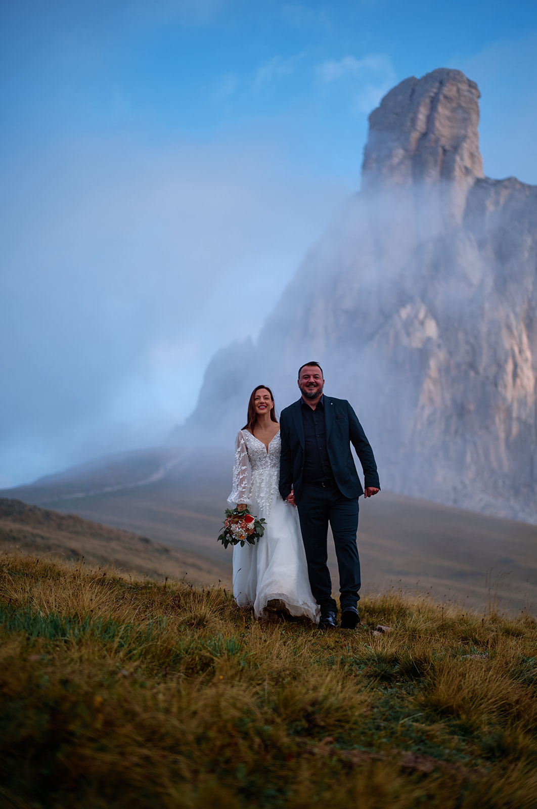Sunrise wedding portraits at Passo Giau, Dolomites