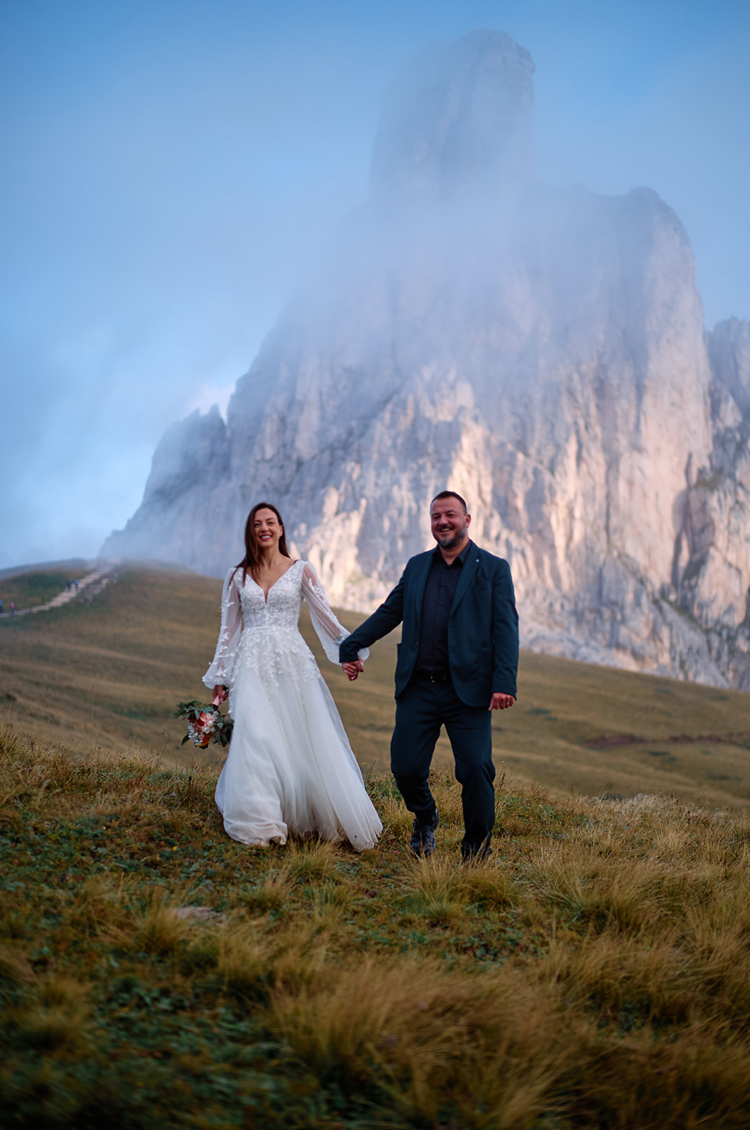 Couple at Passo Giau at first light, Dolomites wedding
