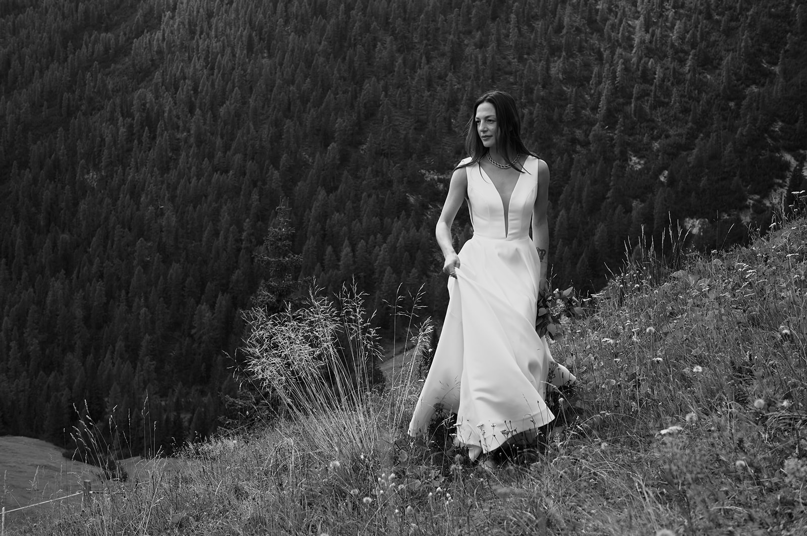 Bride with wild horses at Prato Piazza, Dolomites
