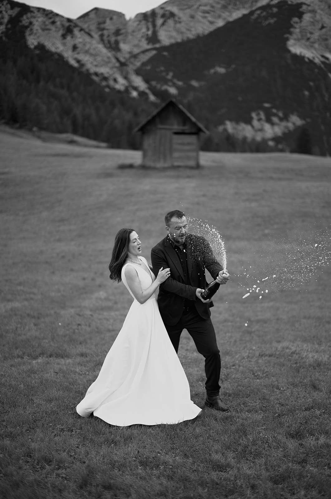 Bride with wild horses at Prato Piazza, Dolomites