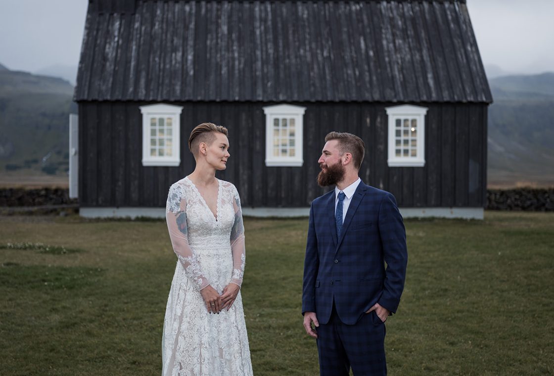 Amelia and Adam at Búðakirkja, the black church at Búðir, a Hótel Búðir wedding