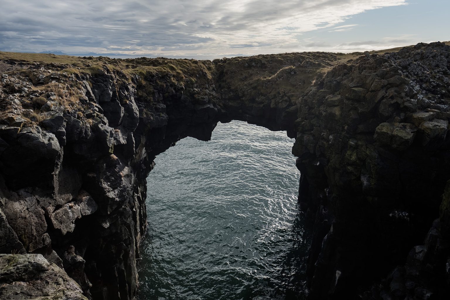 A lava sea arch on the Snæfellsnes coast, Iceland