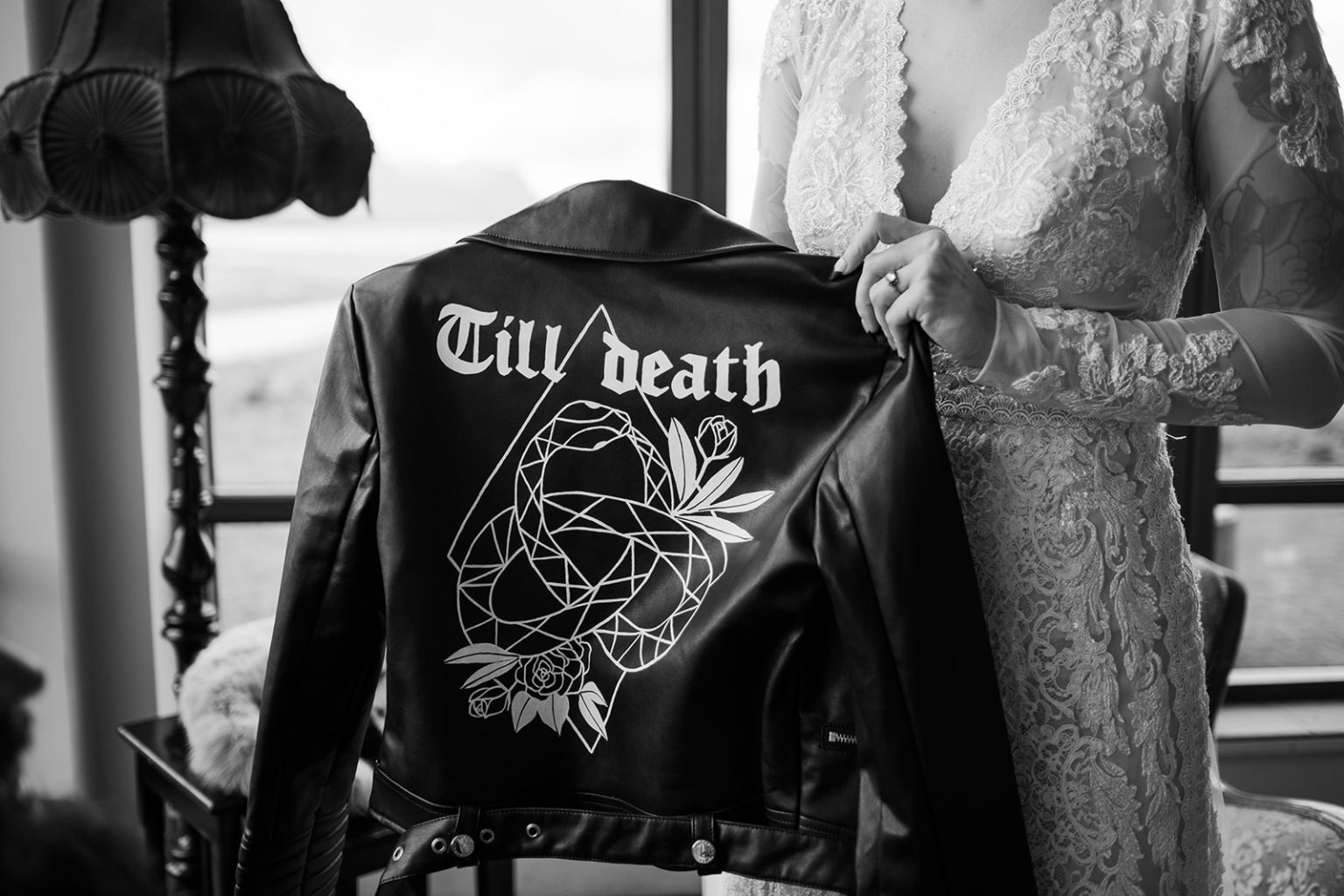 A leather band jacket laid out for the day, Búðir wedding