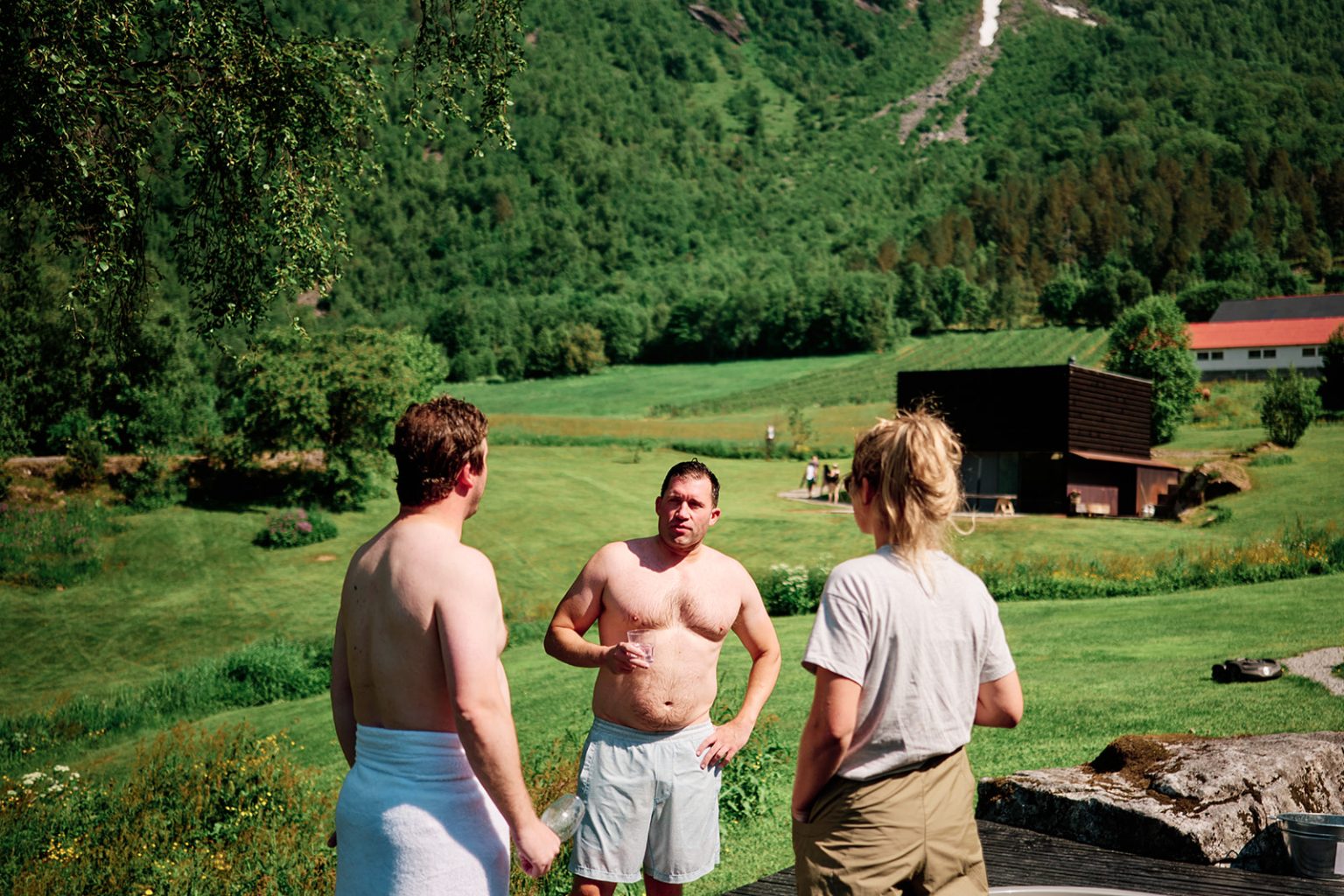 Guests swimming in the river at Juvet