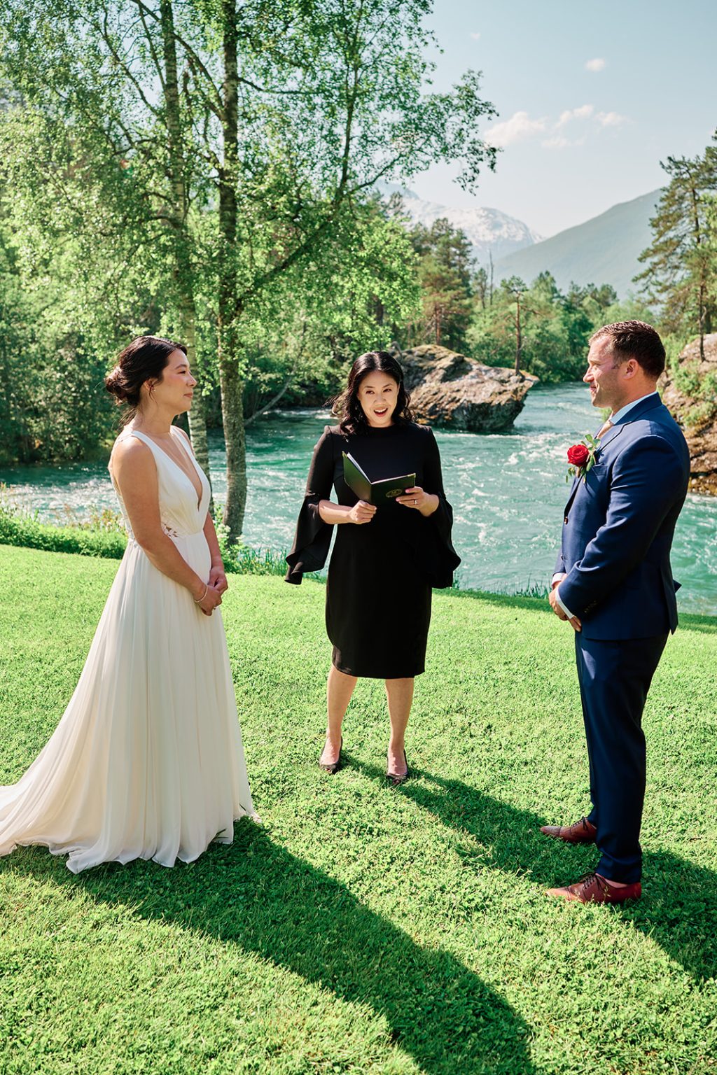 Nina and Will laughing during the ceremony