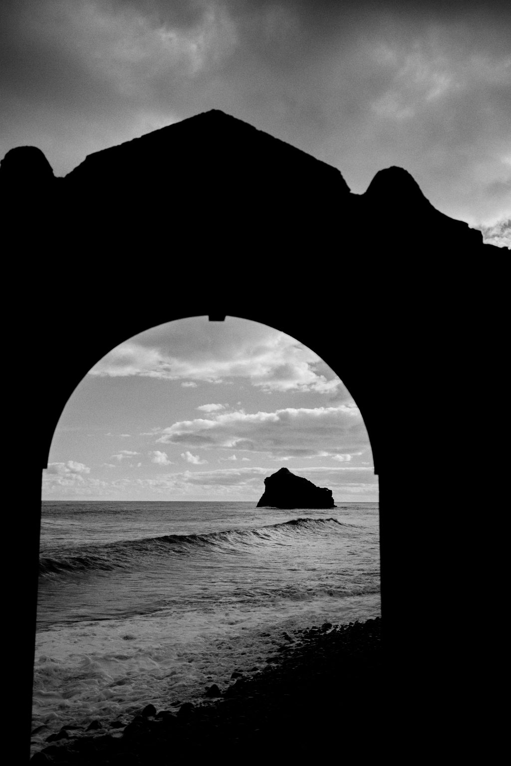 Stone arch of the Ruinas de Sao Jorge above the sea, Madeira