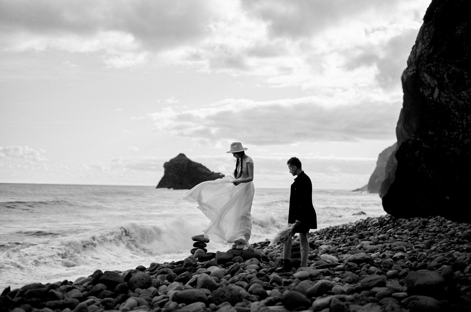 Bride by the sea stacks at Ribeira da Janela, black and white, Madeira