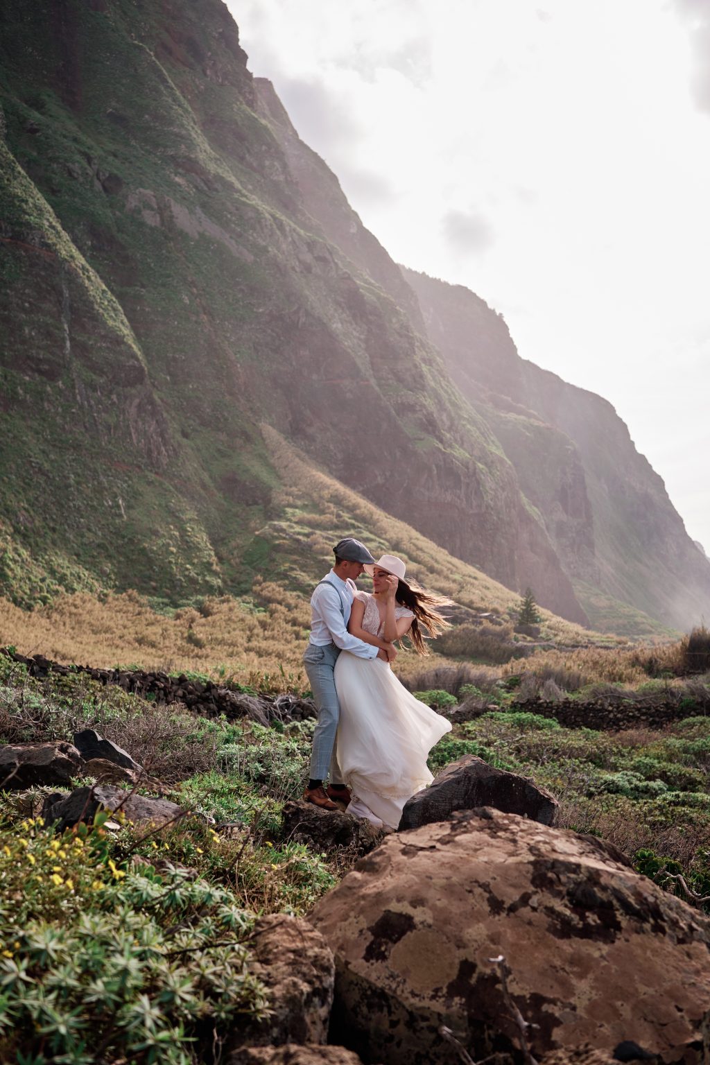 Couple on the green cliffs at Achadas da Cruz, Madeira engagement session