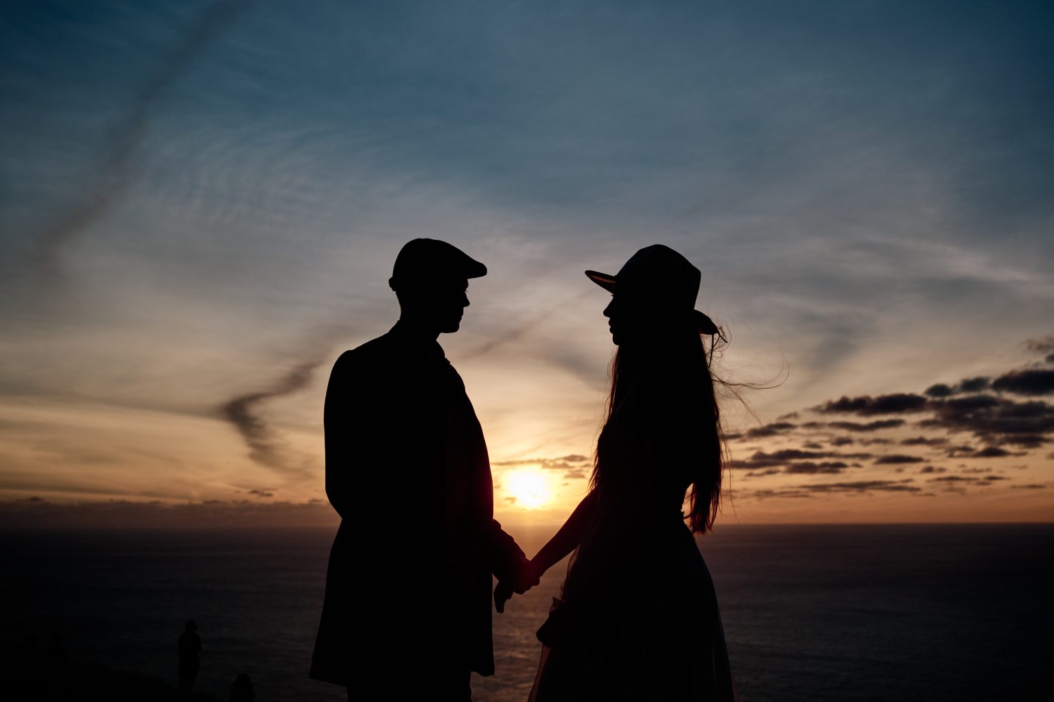 Couple silhouette at sunset over the sea, Ponta do Pargo, Madeira engagement photographer
