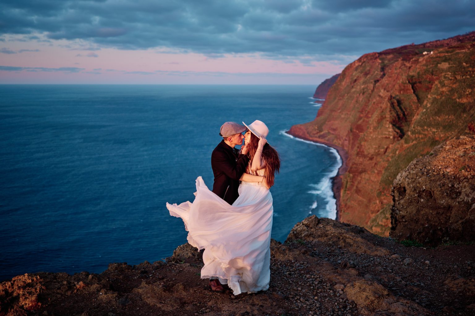 Silvia and Florin on the cliffs at sunset, Farol da Ponta do Pargo, Madeira