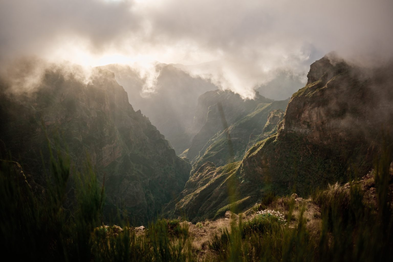 Misty green mountain valley near the Miradouro do Boqueirao, Madeira