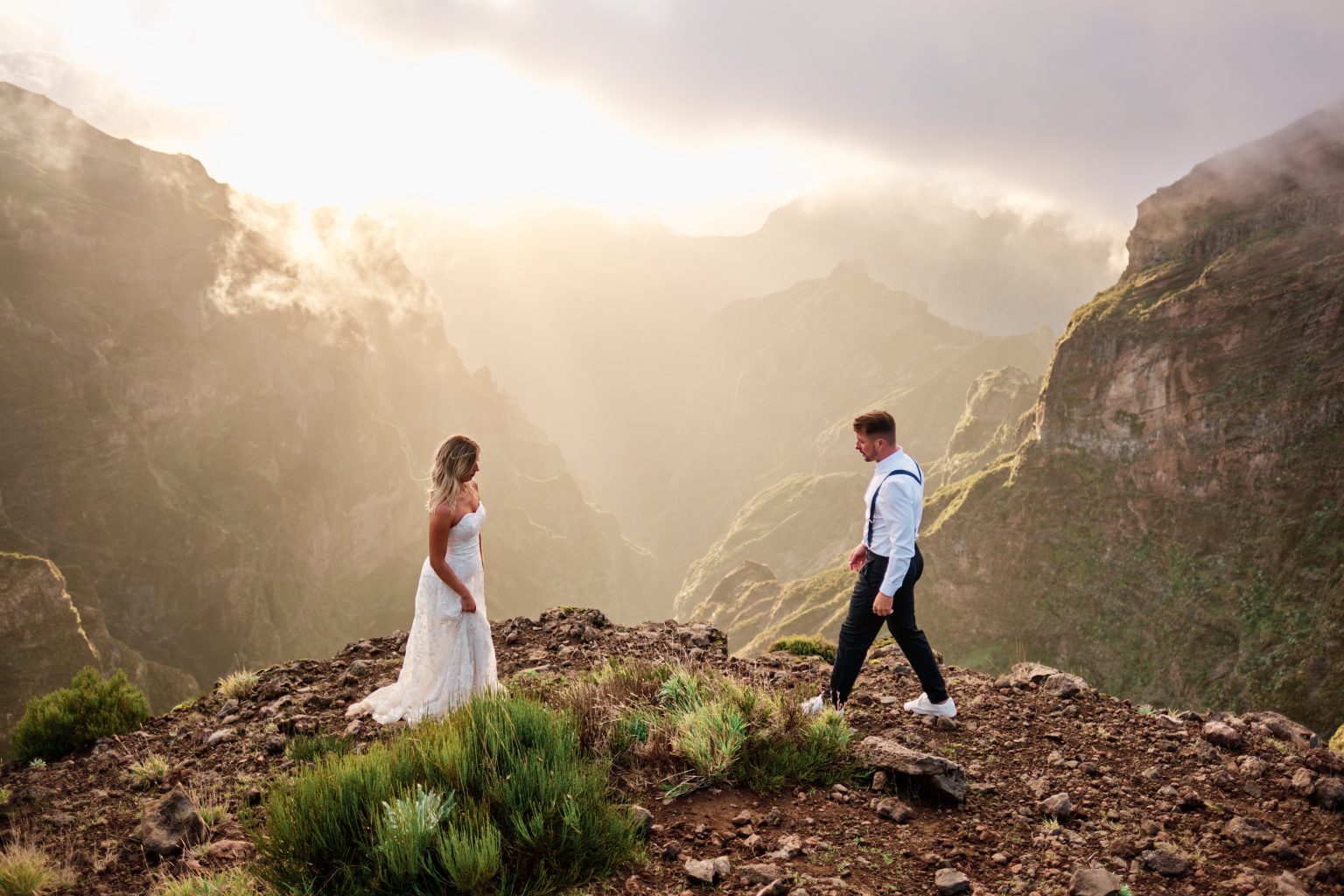 Couple on a ridge in golden evening light, Pico do Arieiro, Madeira