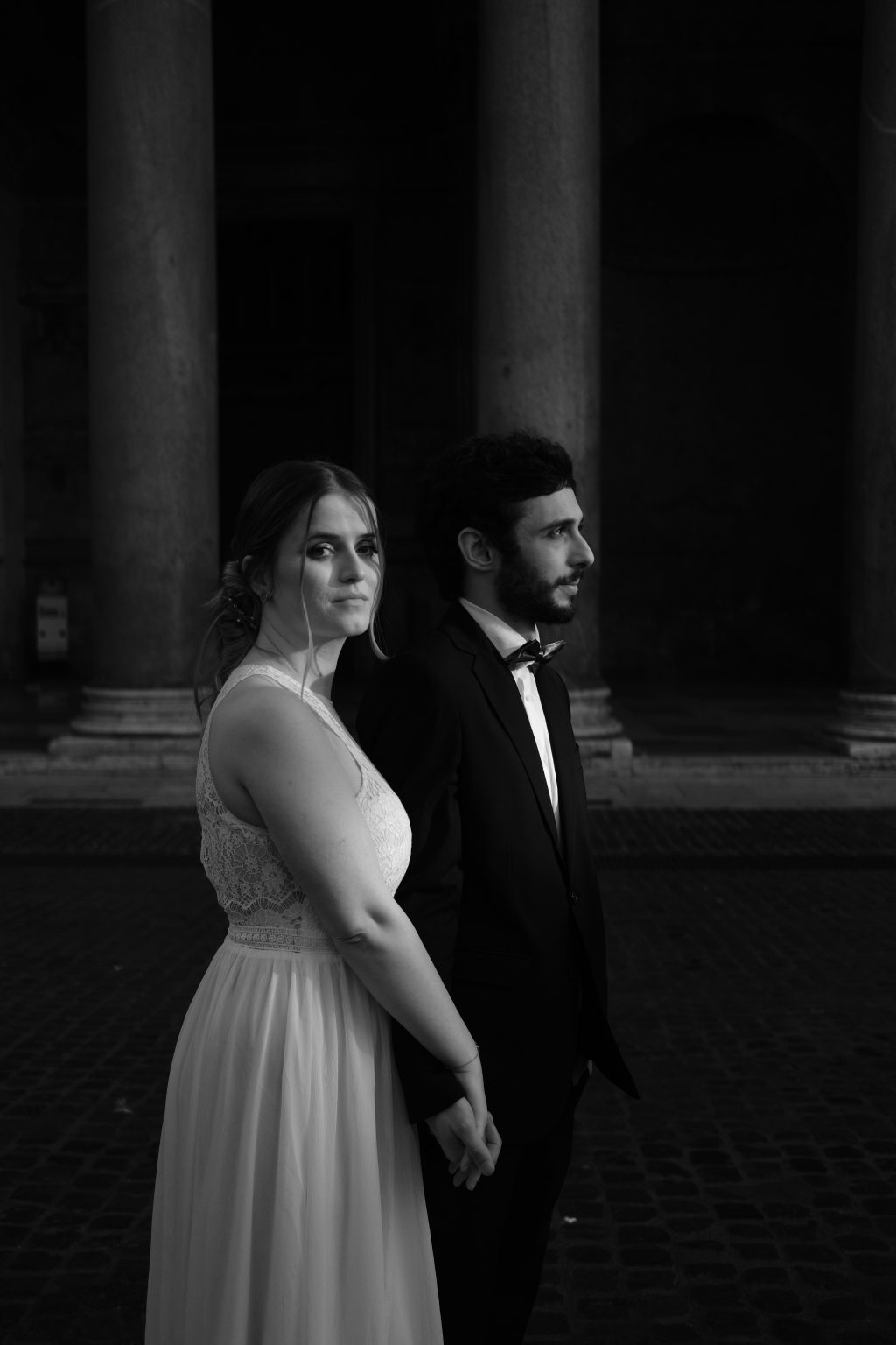 Rozina looking back with Salvatore behind her, Rome engagement photography