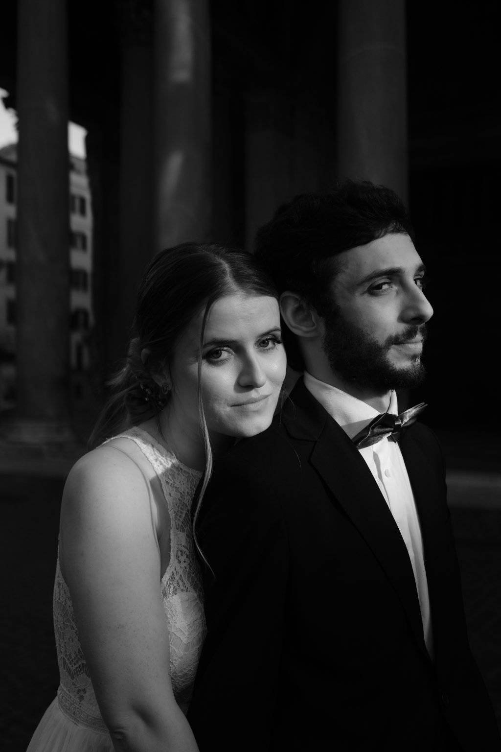 A close double portrait of Rozina and Salvatore in morning shadow