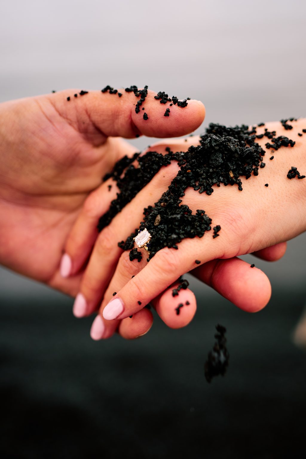 The black sand of Eyrarbakki in the bride’s hand