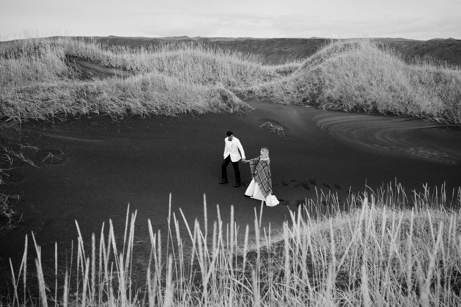Crossing the black sand together at Eyrarbakki