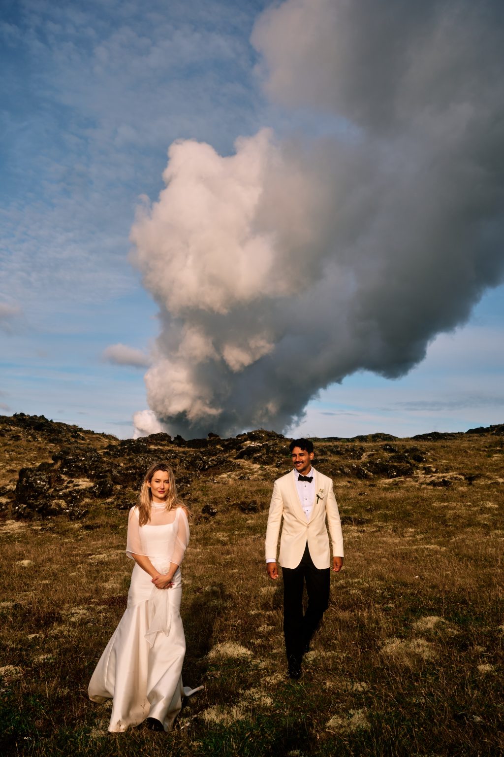 Laughing beneath the steam plume at Gunnuhver hot springs