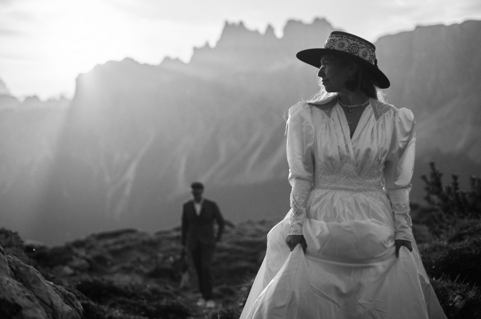 Lilly and Vic walking into the light at Passo Giau