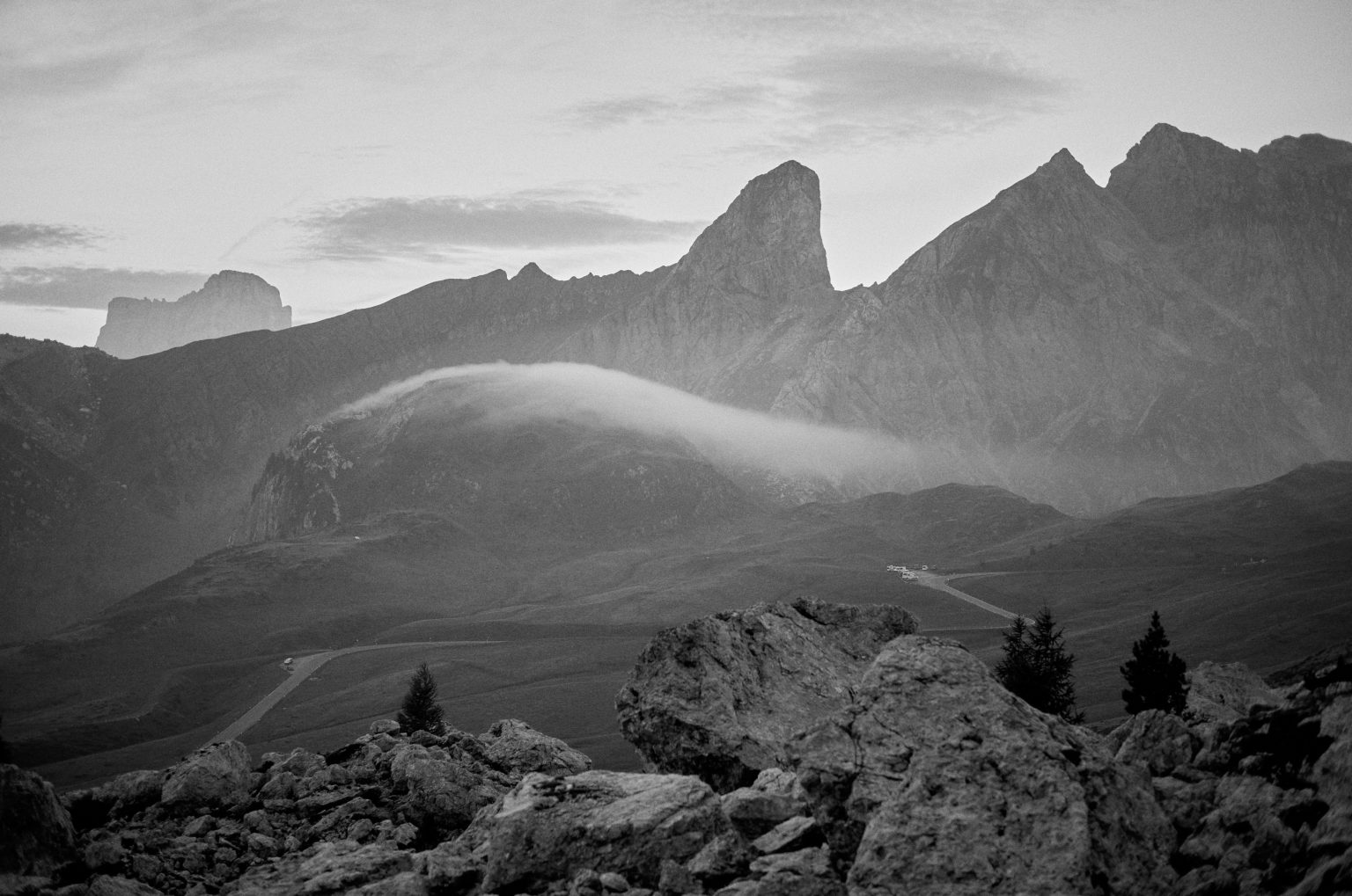 Vic in tweed and a flat cap at Passo Giau at dawn