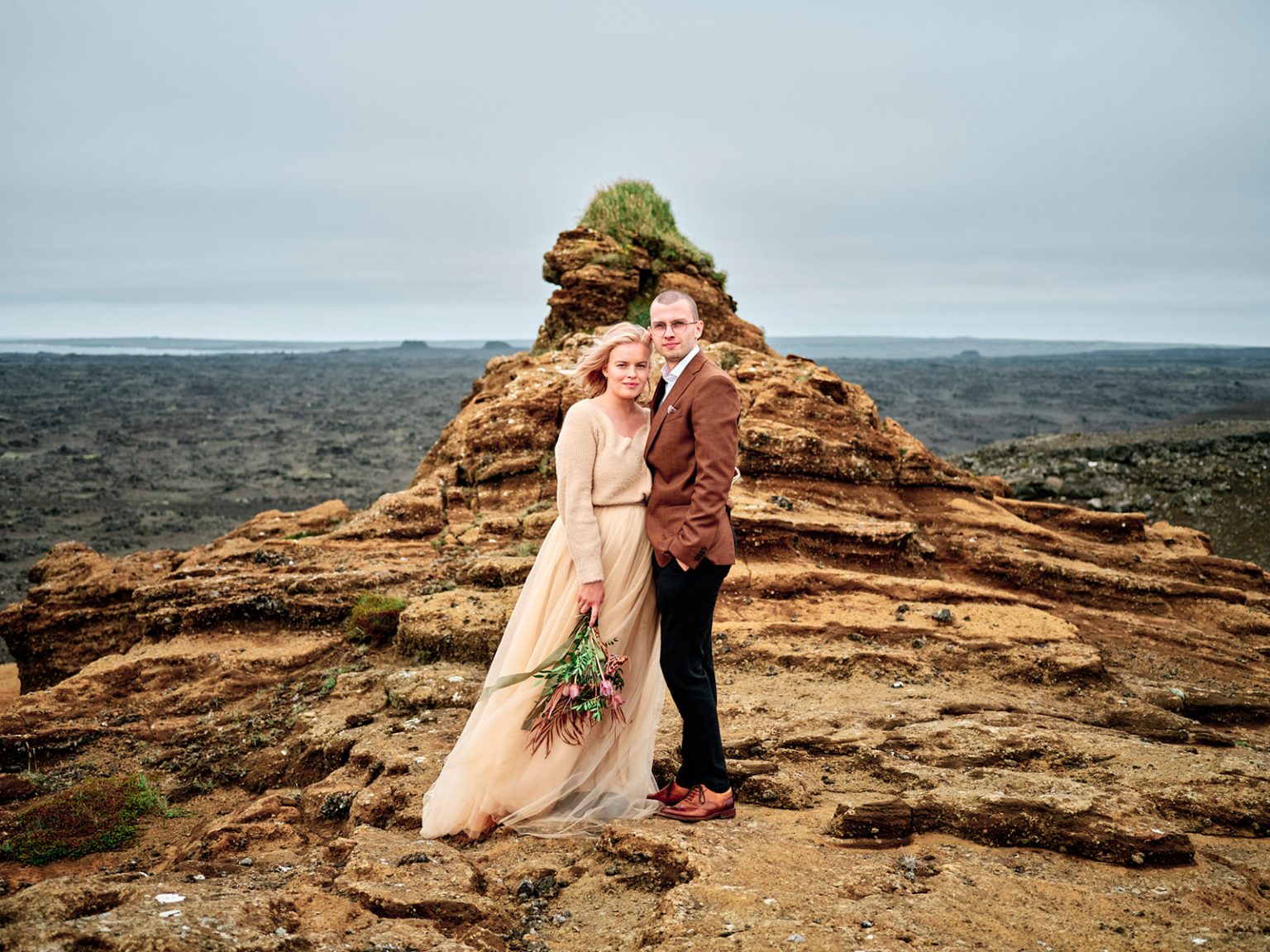 An embrace on the lava by the sea, a Reykjanes engagement